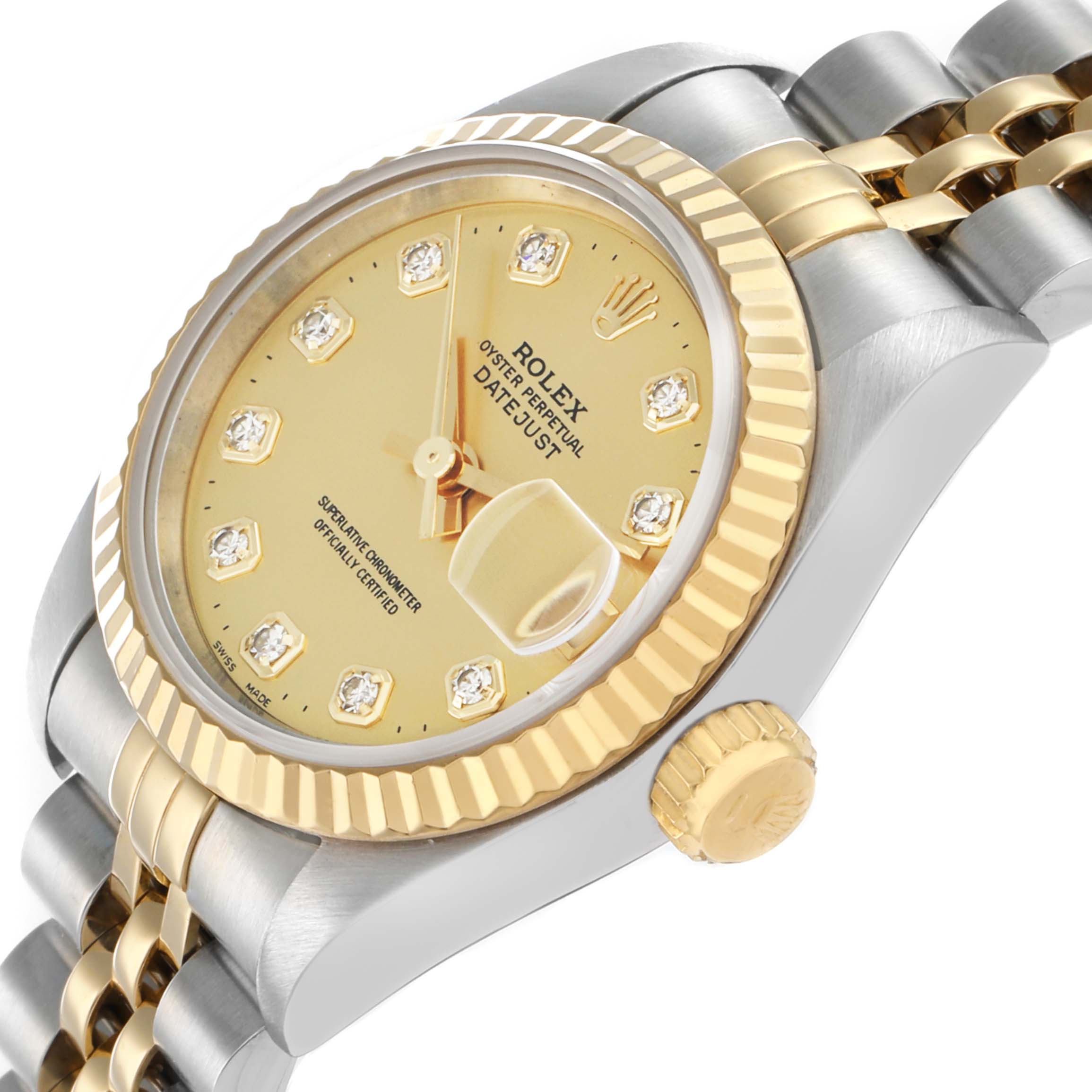 The Rolex Datejust 69173 Women
s Steel and Gold (two tone) Champagne Dial watch is shown at an angled side view, highlighting the bezel, dial, crown, and part of the bracelet.