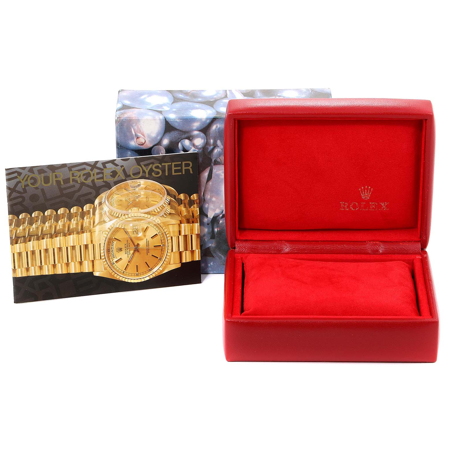 This image shows the packaging and booklet for a Rolex Datejust 179173 Women's Steel and Gold (two tone) Mother of Pearl Dial 179173 Women's Steel and Gold (two tone) Mother of Pearl Dial watch, including a red watch box and a pamphlet.