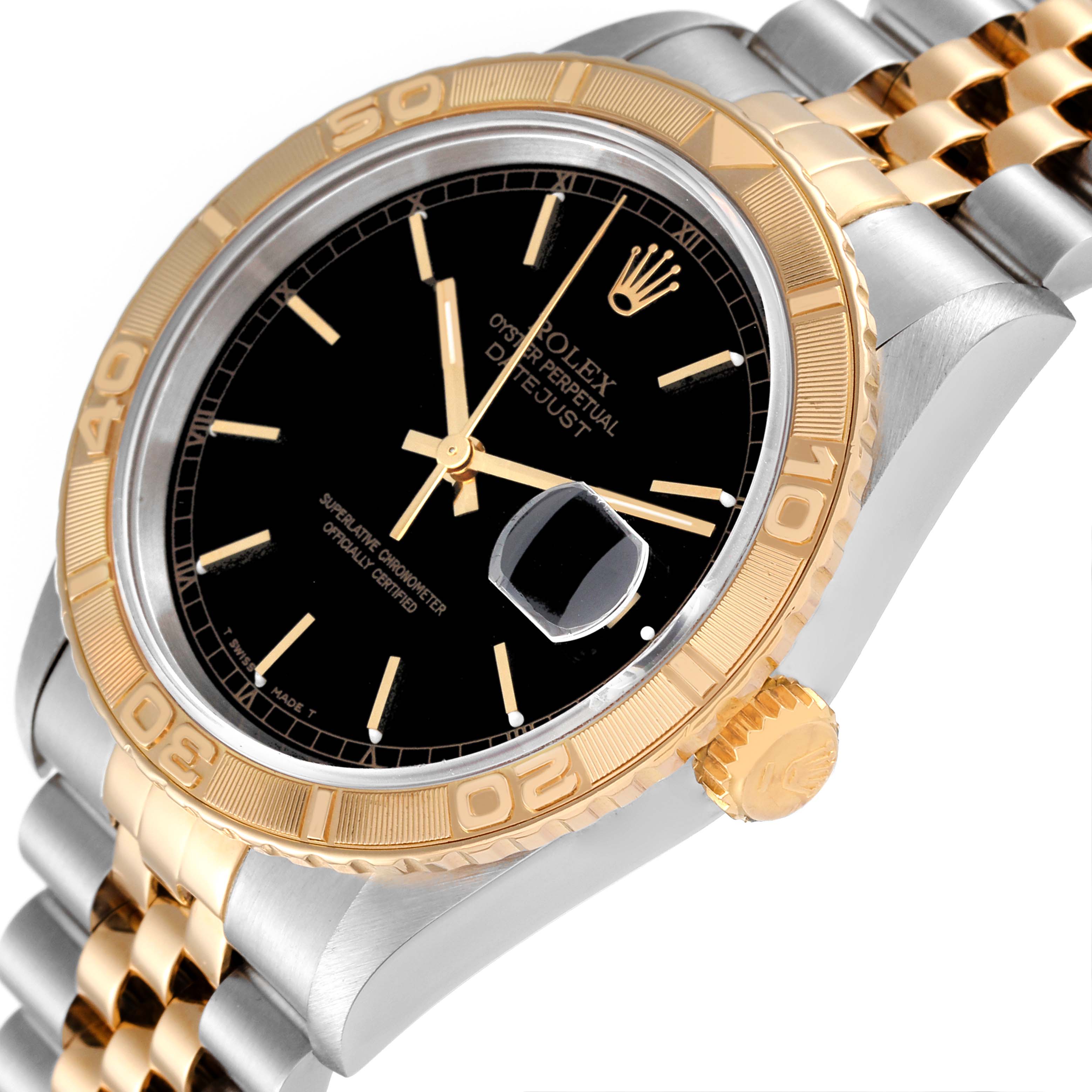 The image shows a close-up view of the Rolex Turn-o-Graph 16263 Men's Steel and Gold (two tone) Black Dial 16263 Men's Steel and Gold (two tone) Black Dial watch face, bezel, and partial bracelet.