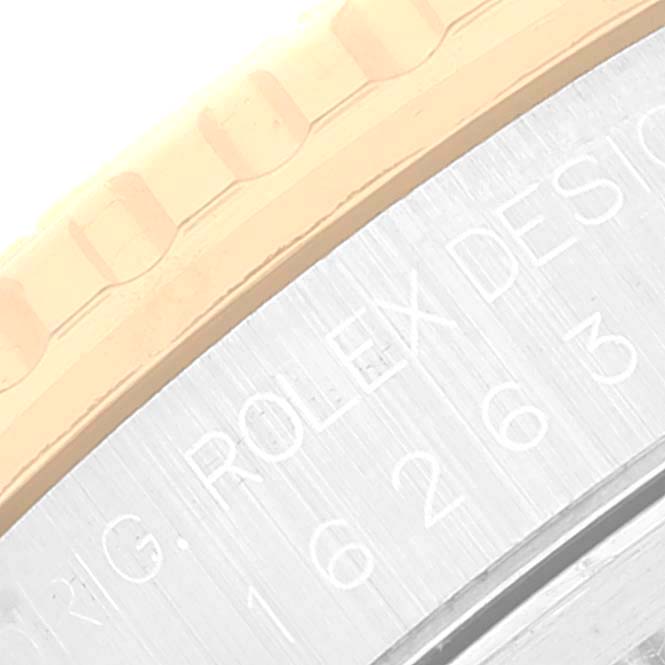 The image shows a close-up of the bezel and the edge of the casing with branding and model information for the Rolex Turn-o-Graph 16263 Men's Steel and Gold (two tone) Black Dial 16263 Men's Steel and Gold (two tone) Black Dial watch.