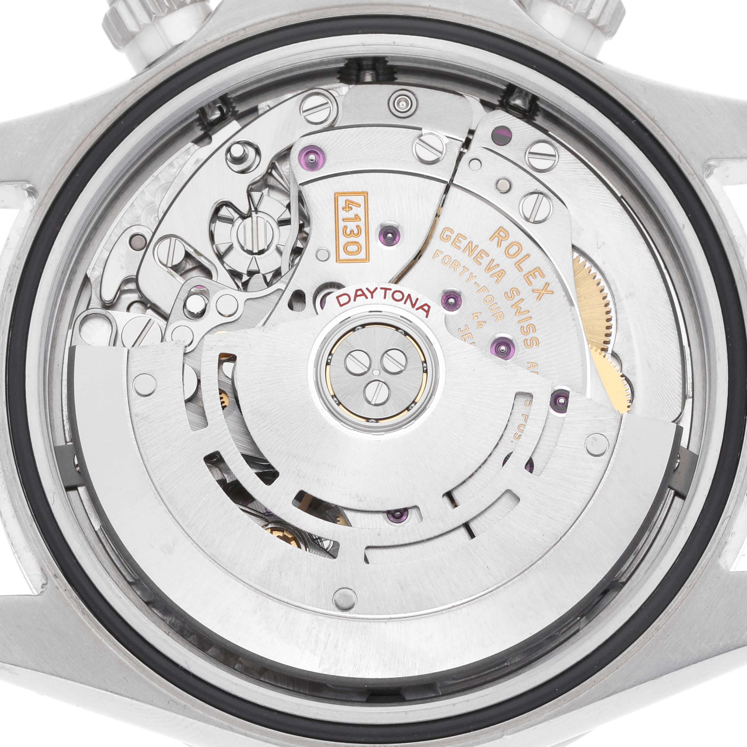 This image shows the Rolex Daytona 116520 Men
s Stainless Steel White Dial
s movement, viewed from the back, highlighting the intricate gears and mechanisms.