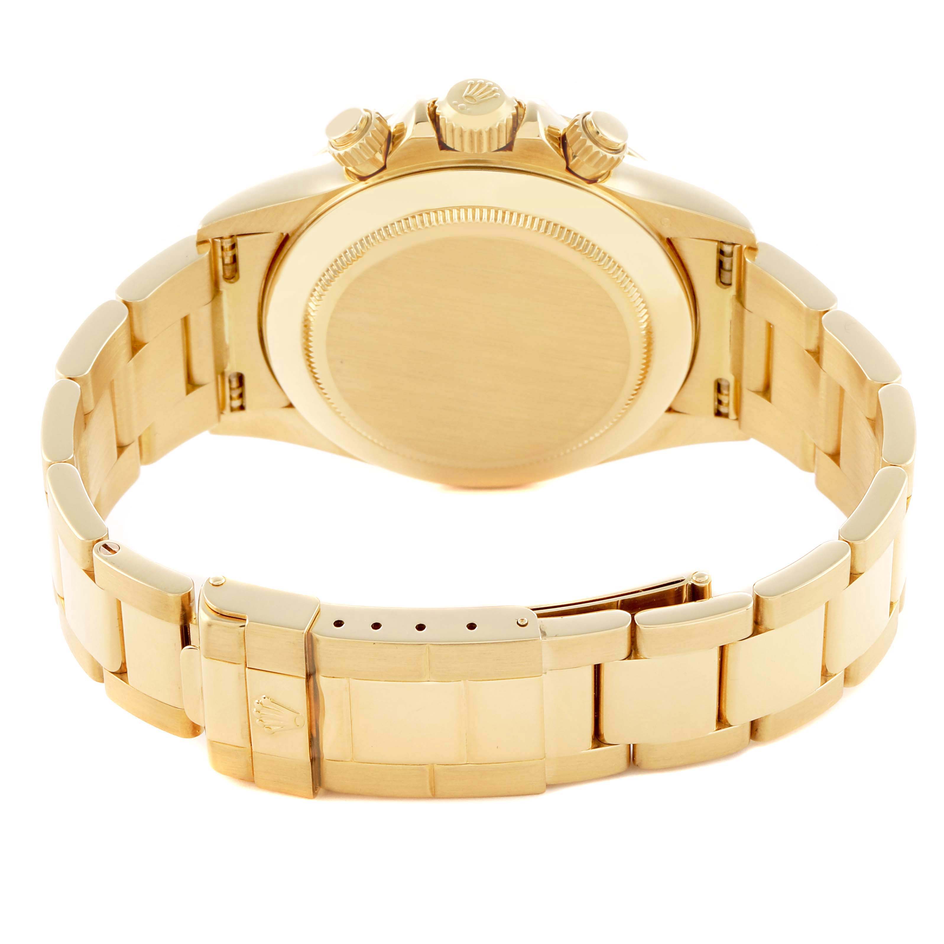 The image shows the back view of a Rolex Daytona 16528 Men
s Yellow Gold Black Dial watch, featuring the case back, bracelet, and clasp.