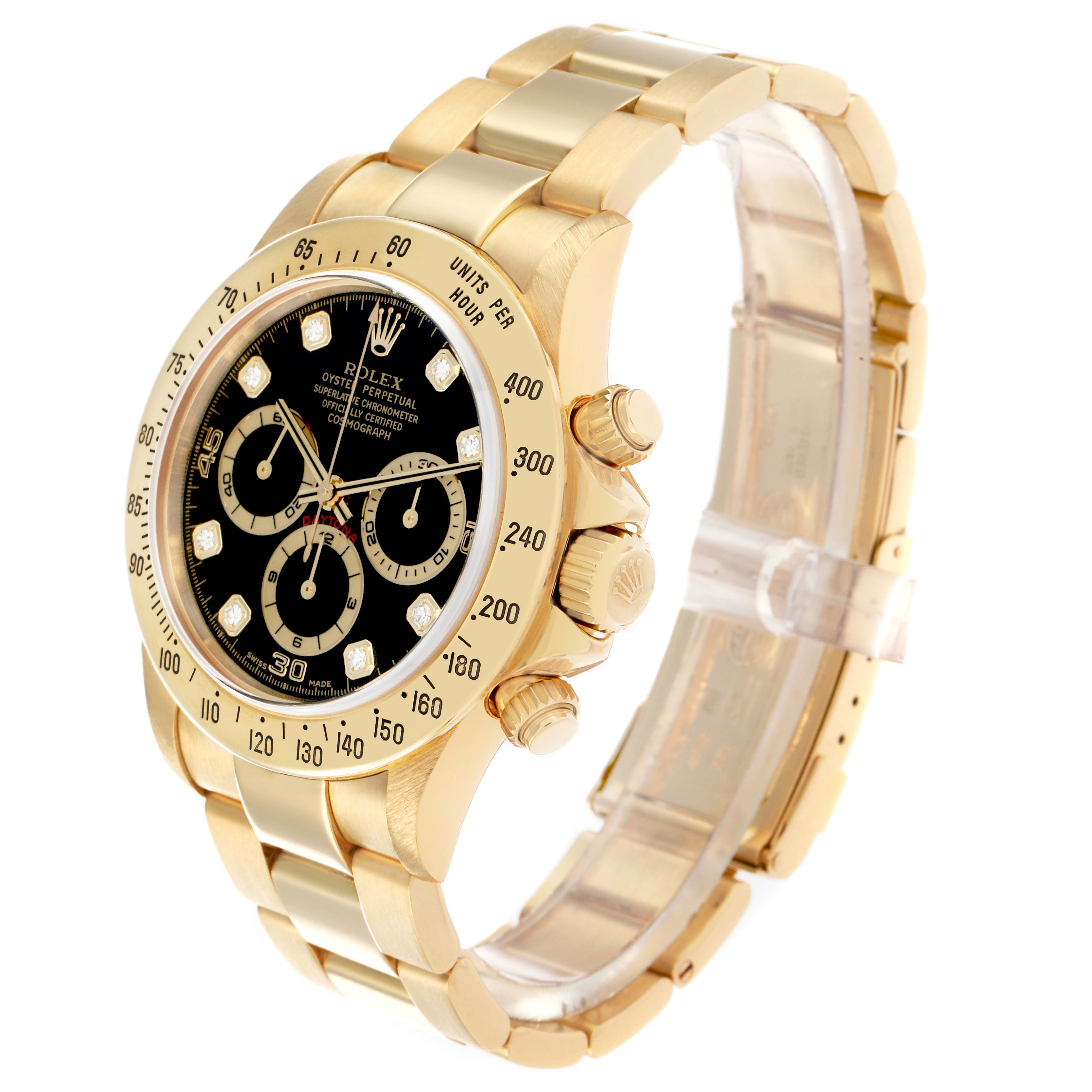The Rolex Daytona 16528 Men
s Yellow Gold Black Dial watch is shown at an angle highlighting the face, bezel, crown, and part of the bracelet.