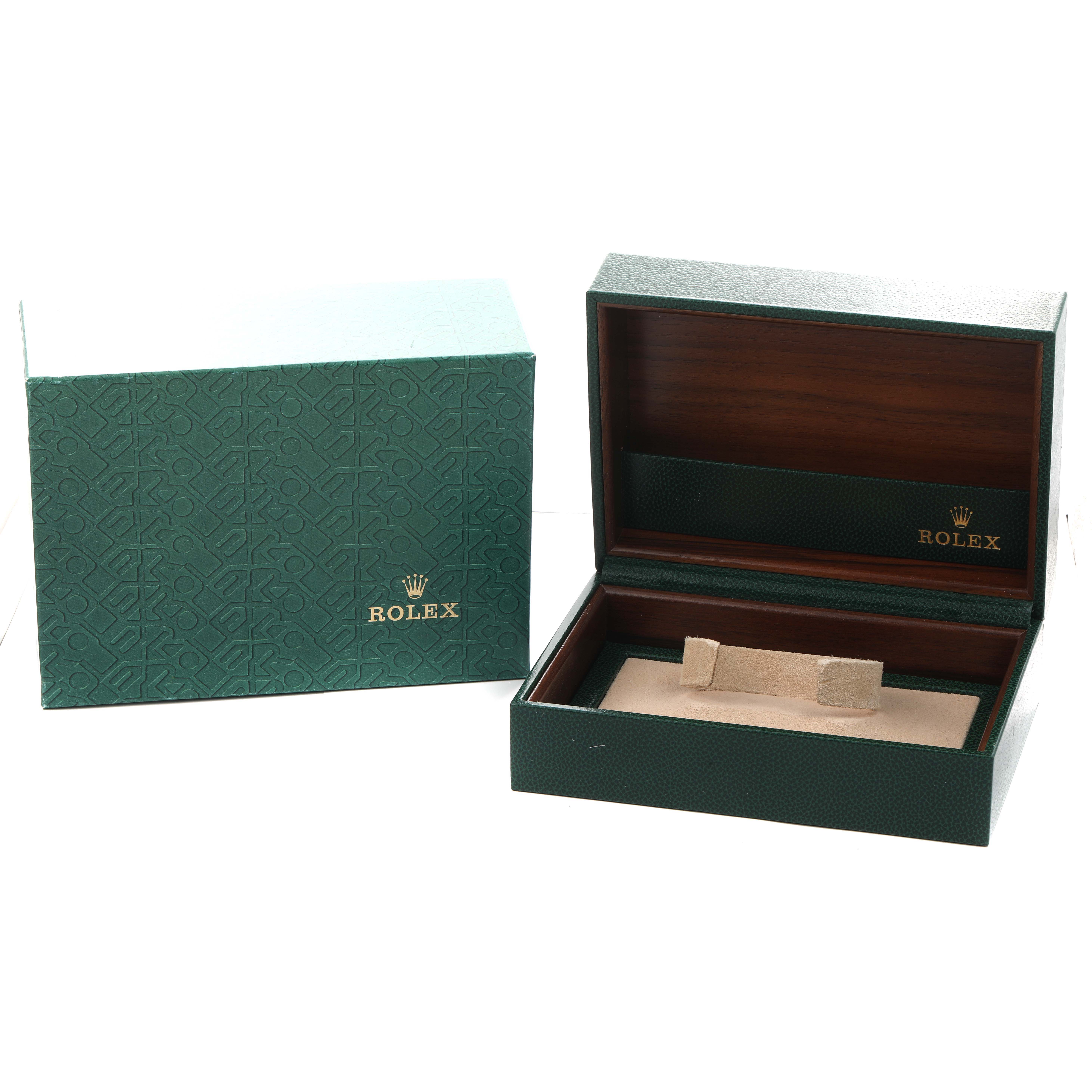 The image shows a Rolex Daytona 16528 Men
s Yellow Gold Black Dial watch box at an angle, with an open interior and a separate outer box.