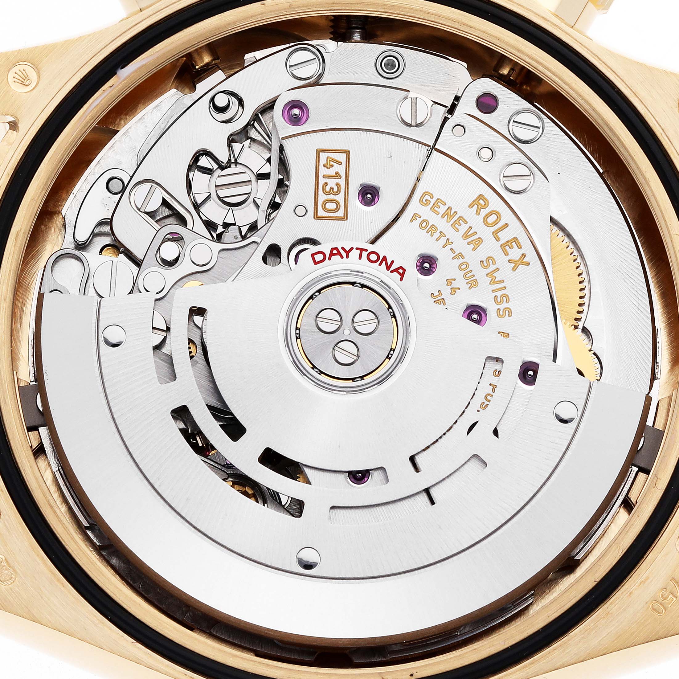 This image shows the Rolex Daytona 116508 Men
s Yellow Gold Green Dial watch movement from a rear angle, highlighting gears and the rotor.