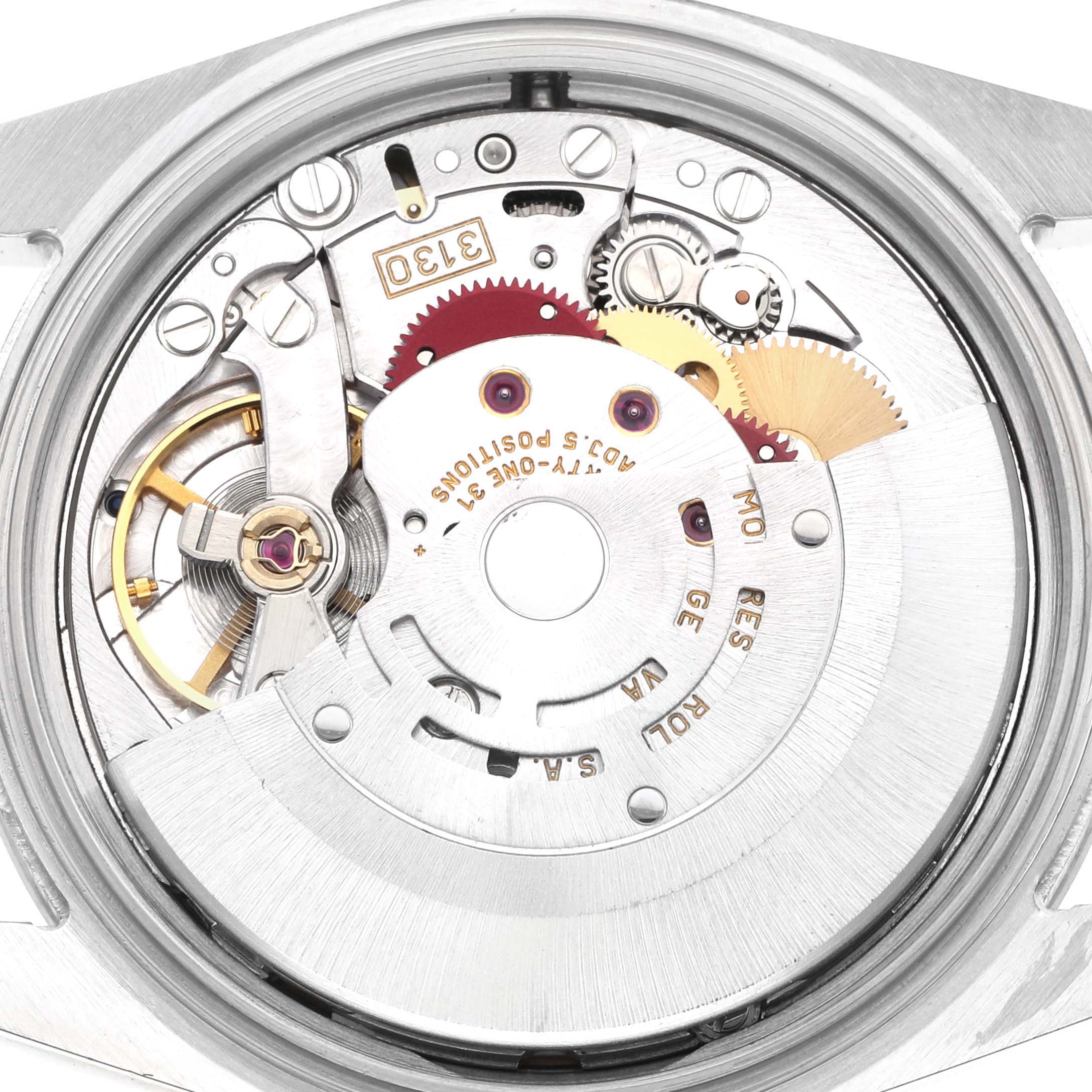The image shows a close-up of the Rolex Explorer 114270 Men
s Stainless Steel Black Dial
s movement from a rear angle, displaying gears, balances, and inscriptions.