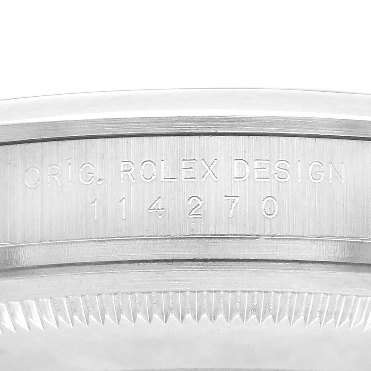 The image shows the side of a Rolex Explorer 114270 Men
s Stainless Steel Black Dial watch case with the model number "114270" engraved on it.