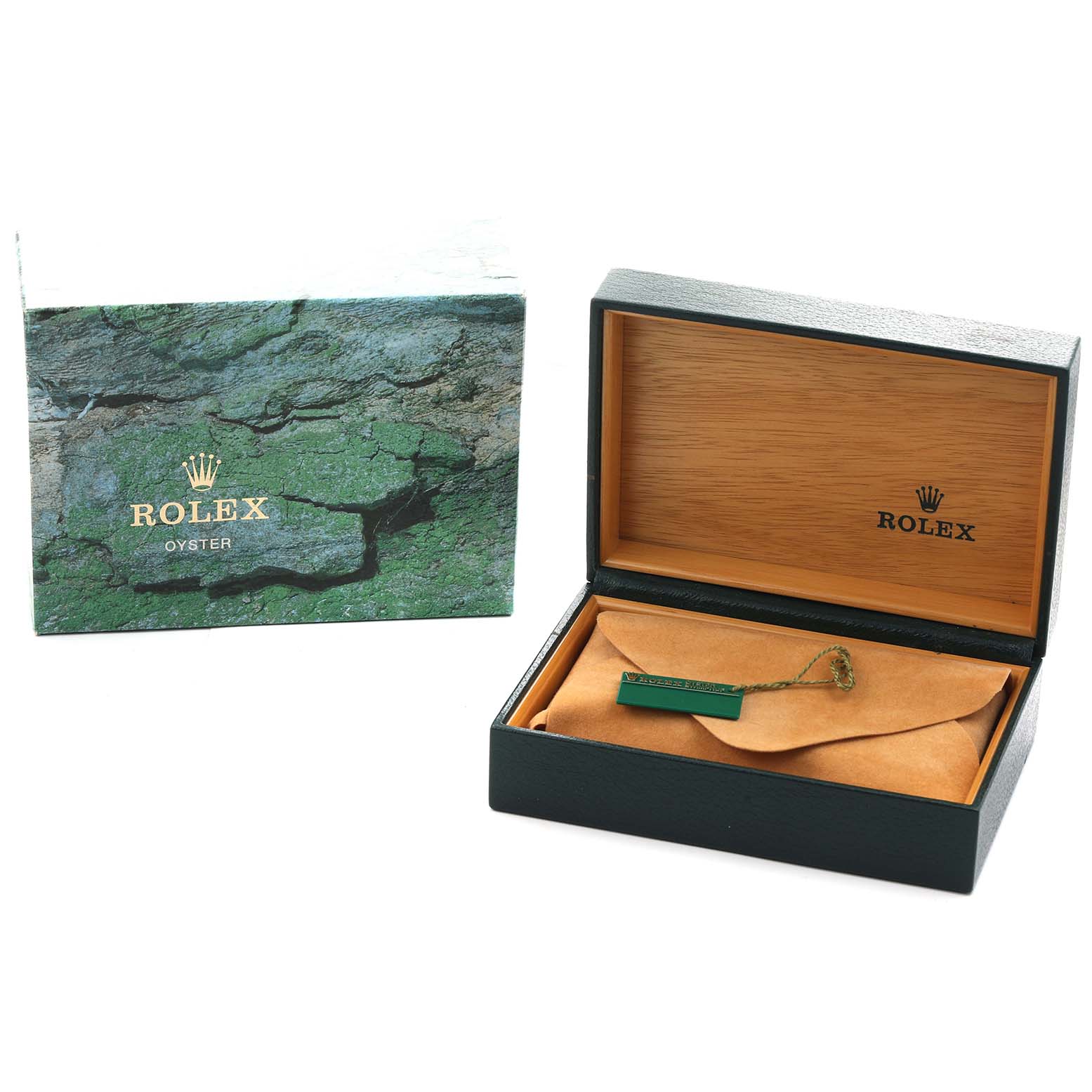 The image shows a Rolex Explorer 114270 Men
s Stainless Steel Black Dial watch box, open, with a suede pouch and a green tag inside, and an outer box beside it.