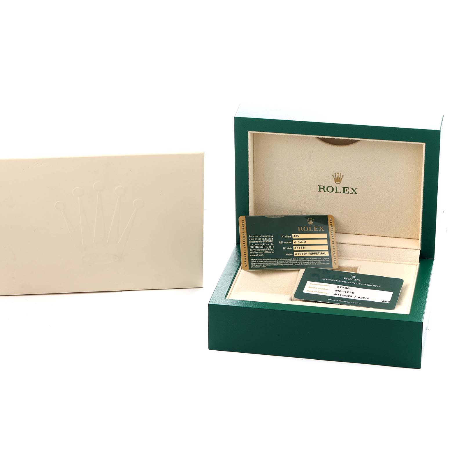 The image shows the open box and warranty cards for a Rolex Explorer 214270 Men
s Stainless Steel Black Dial watch.