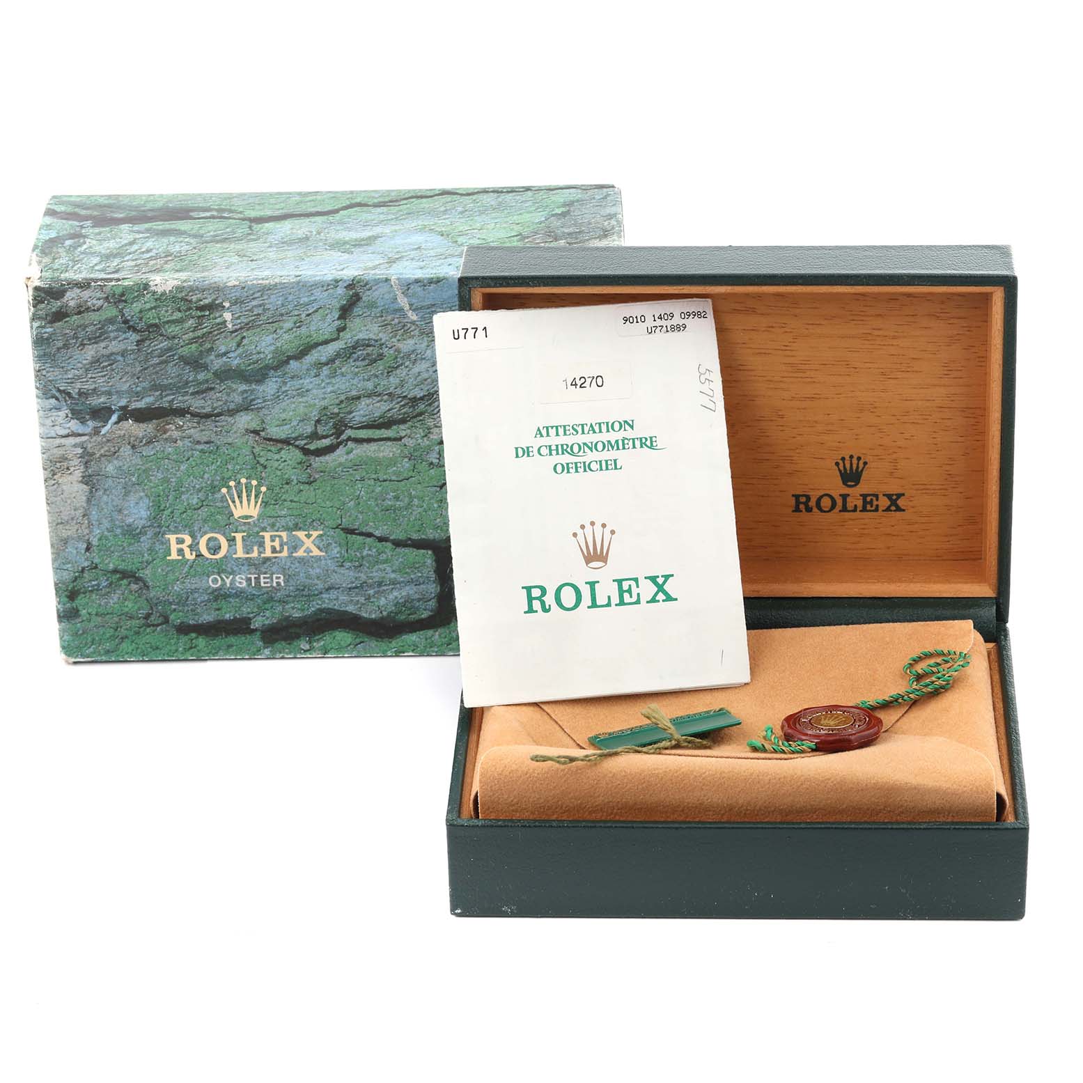 The image shows a Rolex Explorer 14270 Men
s Stainless Steel Black Dial 14270 Men
s Stainless Steel Black Dial model watch box, a certificate, and a tag, viewed from the front.