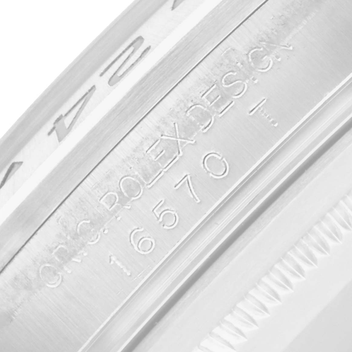 This image shows a close-up of the side engraving on a Rolex Explorer 16570 Men
s Stainless Steel White Dial, highlighting the design and reference number.