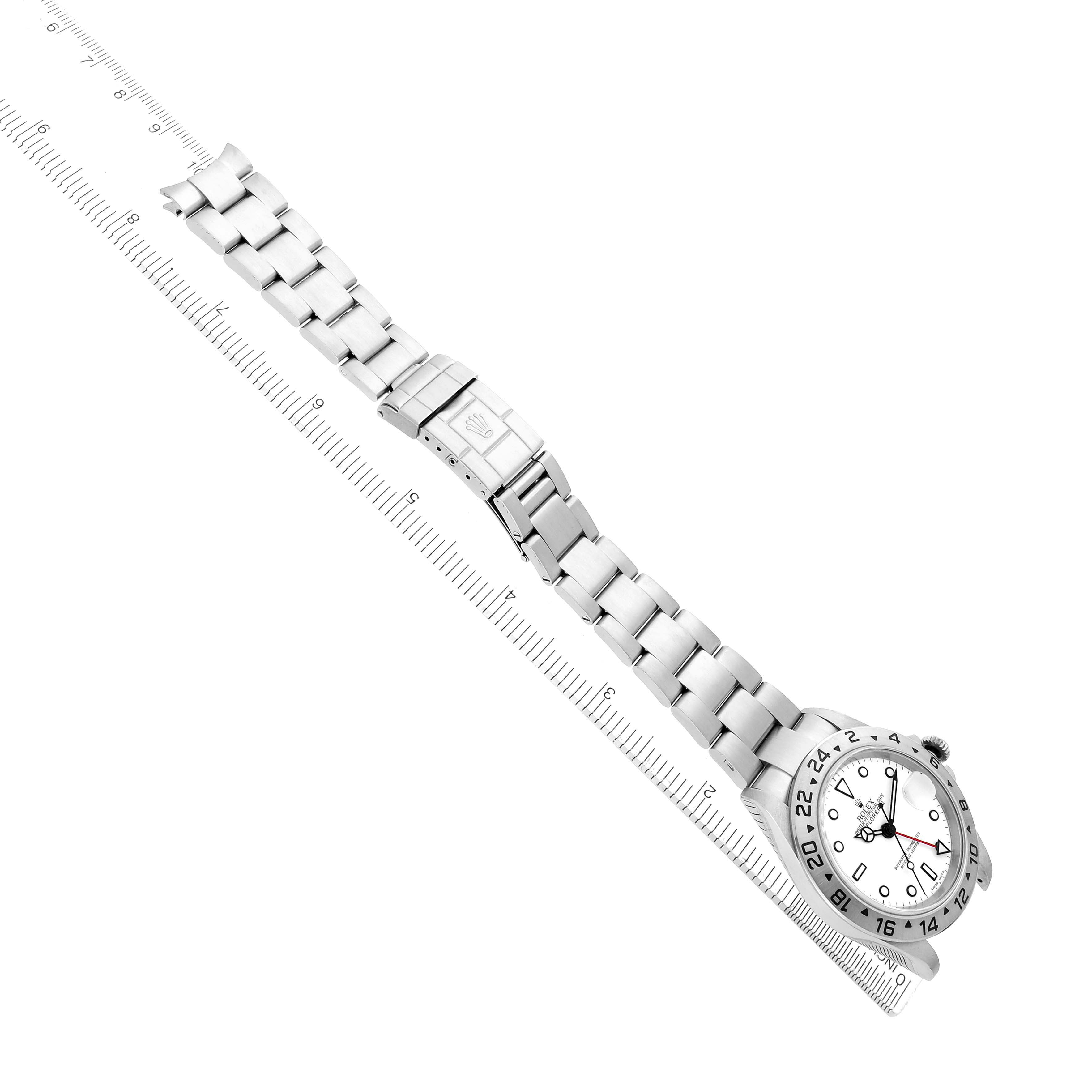 The Rolex Explorer 16570 Men
s Stainless Steel White Dial watch is shown laid flat, showcasing the full bracelet, clasp, and face at a diagonal angle.