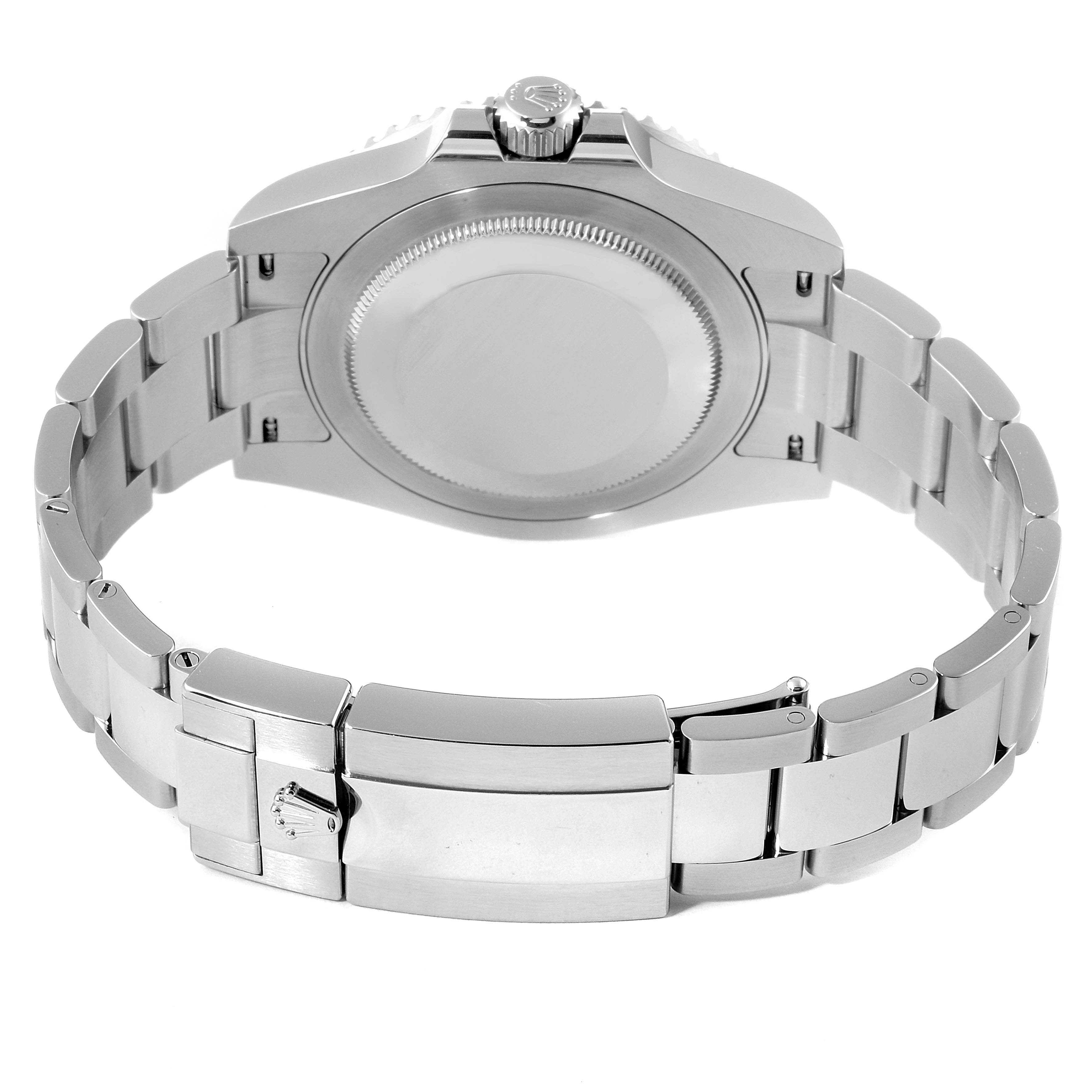 The image shows the back view of a Rolex GMT-Master 126710 Men
s Stainless Steel Black Dial 126710 Men
s Stainless Steel Black Dial watch, highlighting its stainless steel case and bracelet clasp.