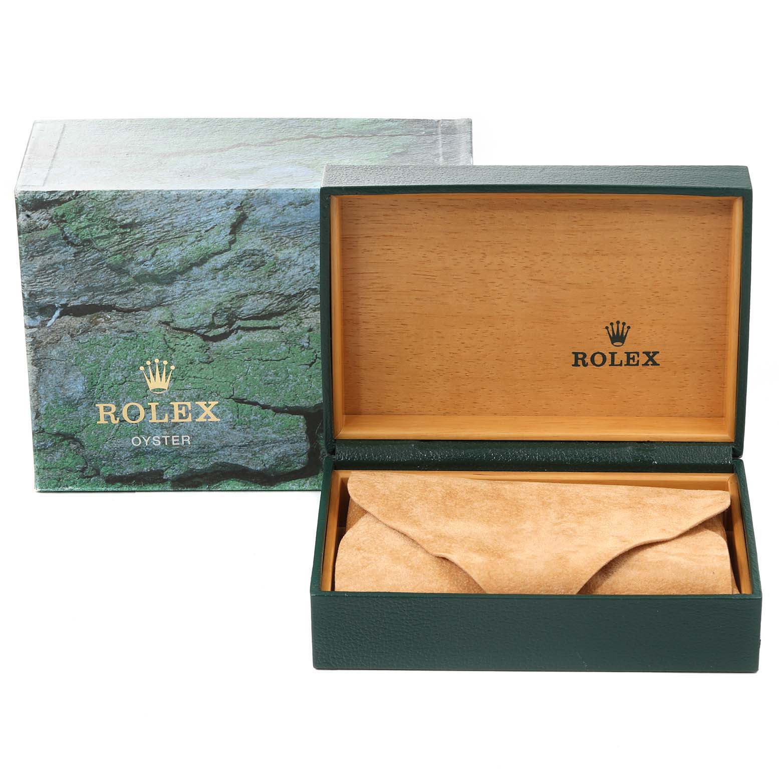 The image shows the packaging for a Rolex GMT-Master 16710 Men
s Stainless Steel Black Dial 16710 Men
s Stainless Steel Black Dial, including an open box with a cushion and an outer box.