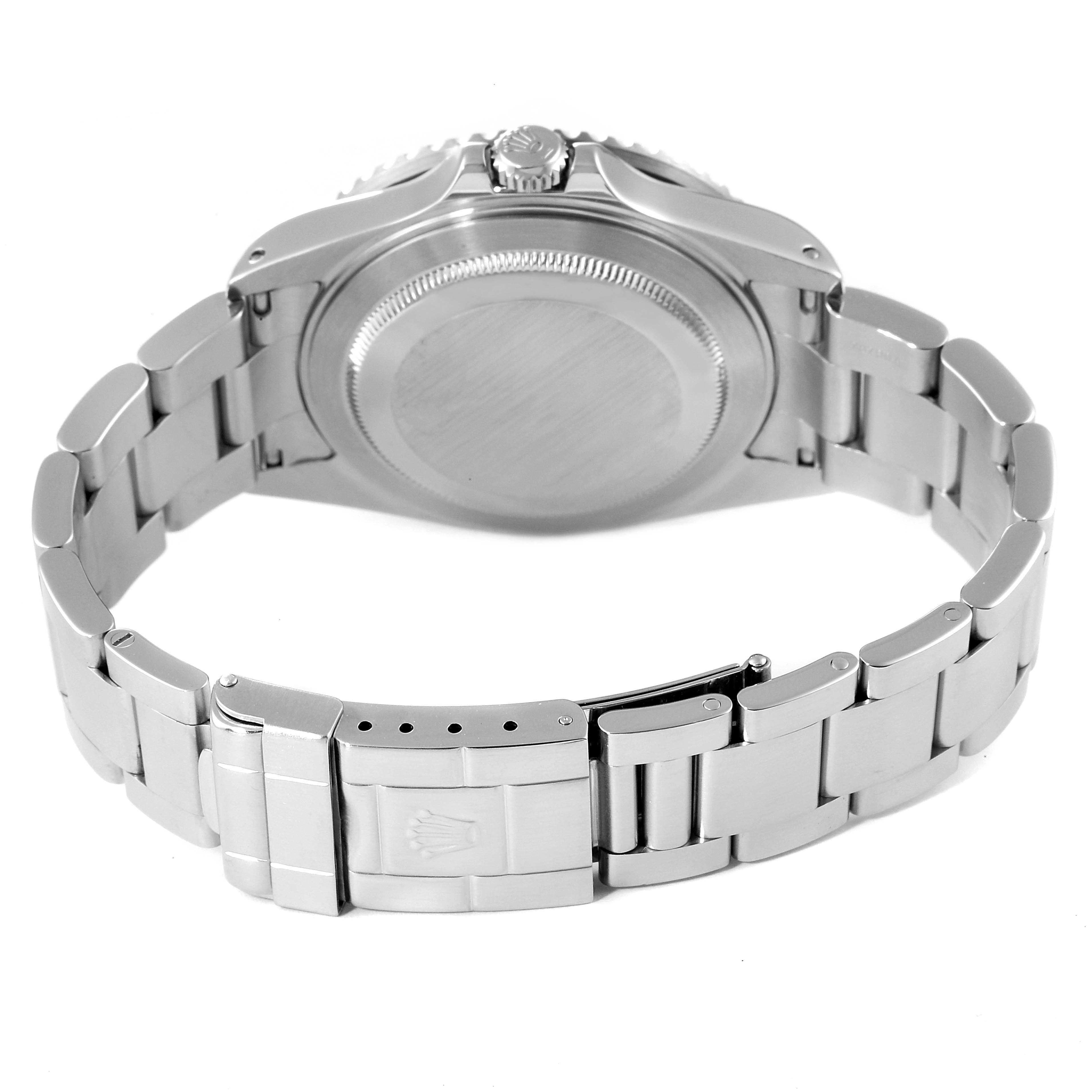 The image shows the back view of a Rolex GMT-Master 16710 Men
s Stainless Steel Black Dial 16710 Men
s Stainless Steel Black Dial watch, highlighting its case back and metal bracelet with a clasp.