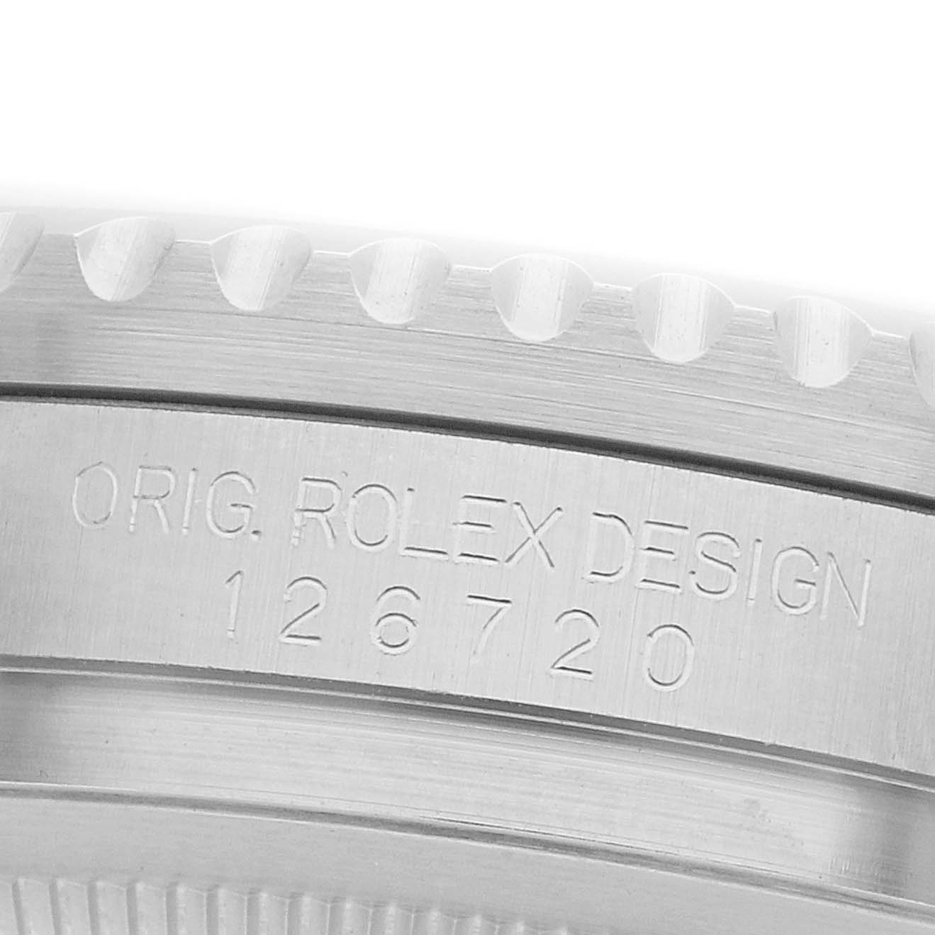 The image shows a close-up of the case side with engraved details on the Rolex GMT-Master 126720 Men
s Stainless Steel Black Dial, focusing on the model number.