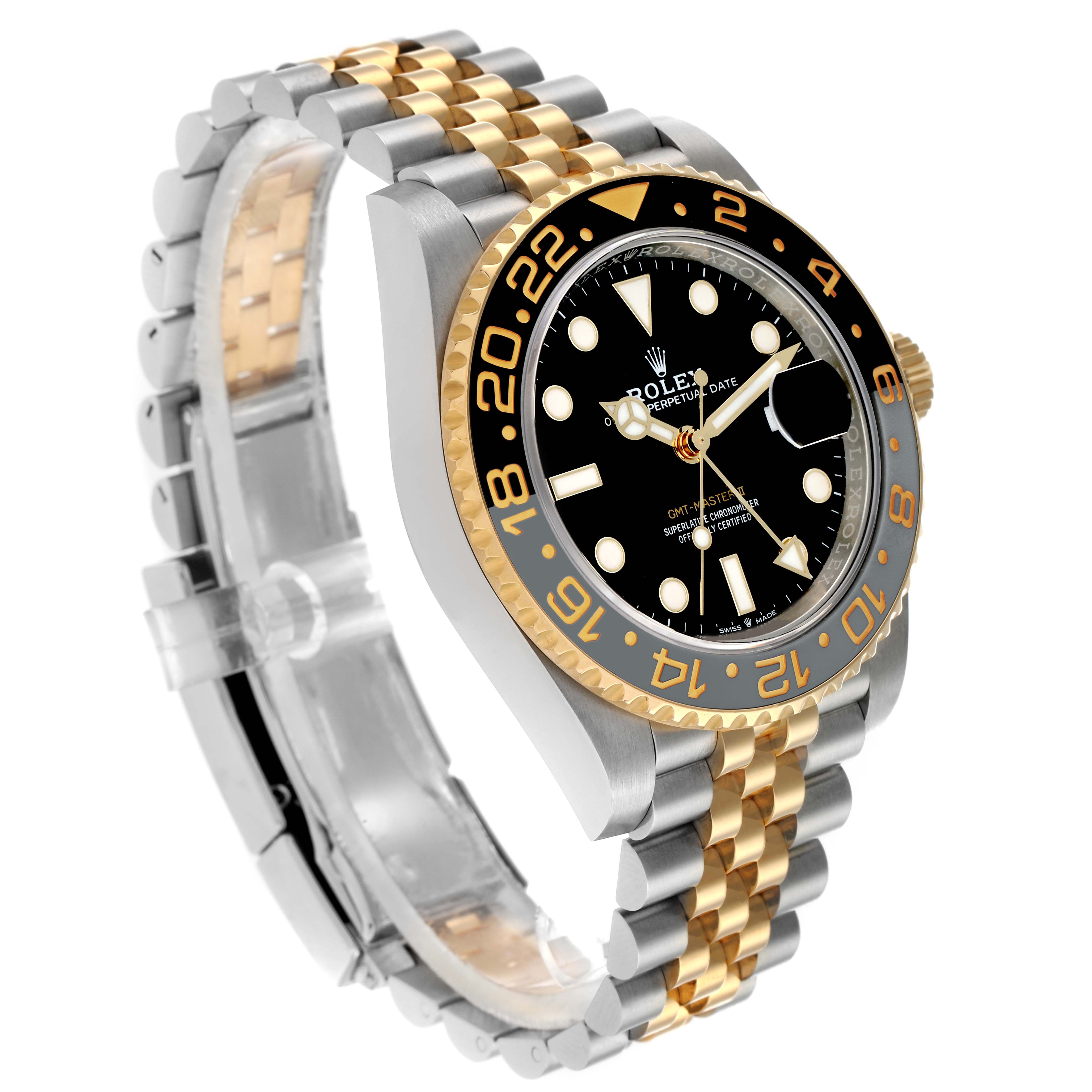 The image shows a side angle of the Rolex GMT-Master 126713 Men
s Steel and Gold (two tone) Black Dial, highlighting the bezel, face, crown, and two-tone bracelet.