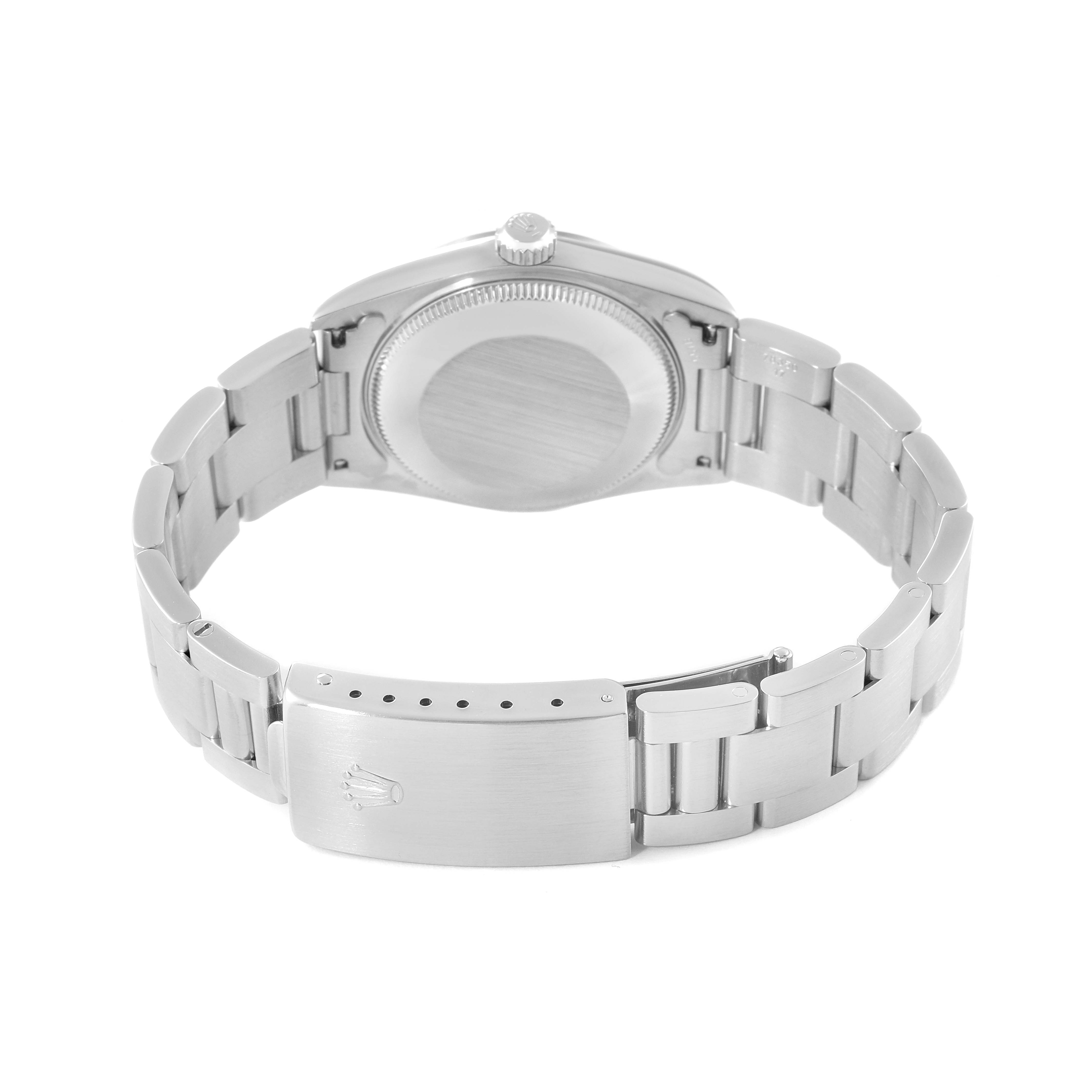 This image shows the back view of the mid-size Rolex watch, focusing on the case back, bracelet, and clasp.