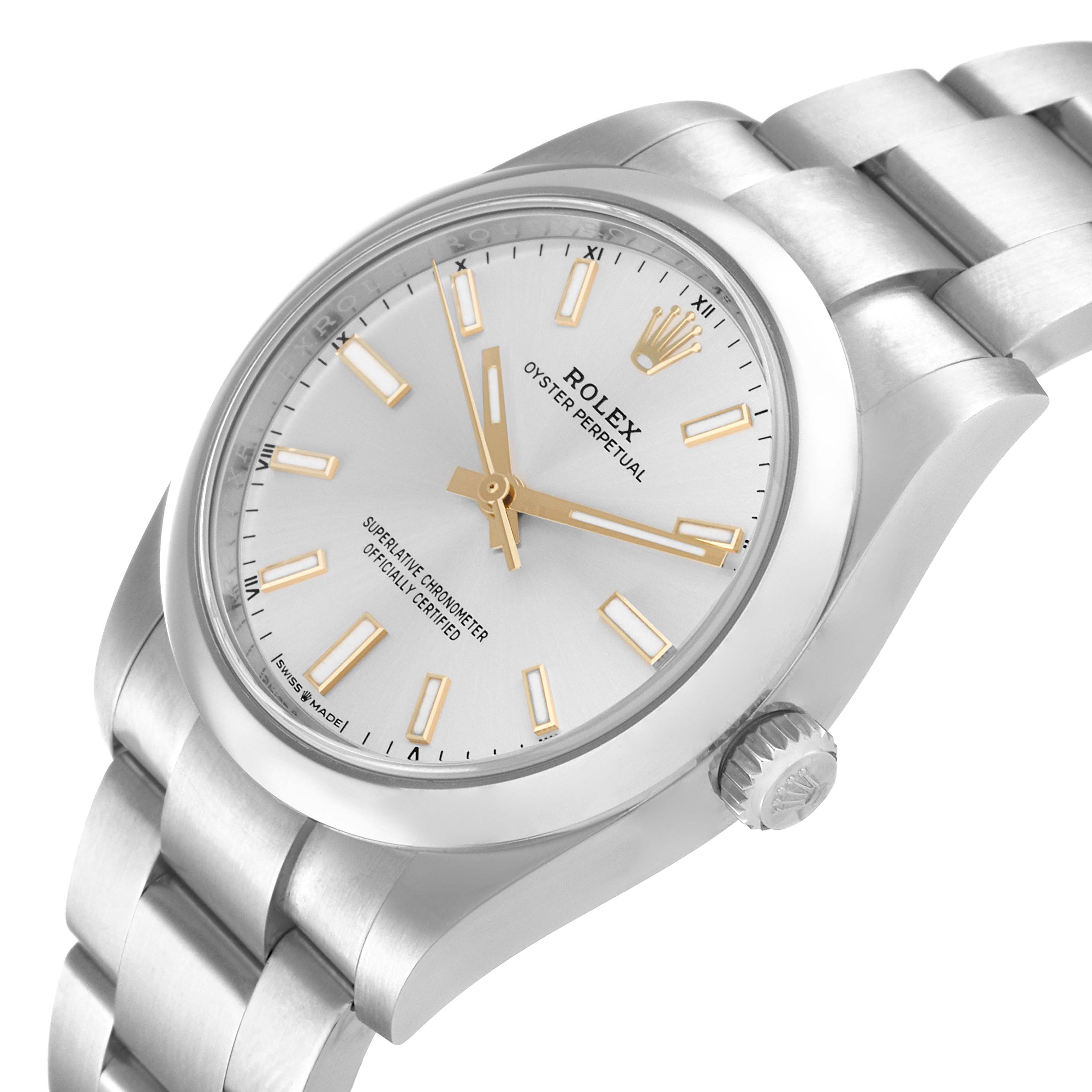 The image shows a side view of a Rolex Oyster Perpetual 124200 Men's Stainless Steel Silver Dial 124200 Men's Stainless Steel Silver Dial watch displaying its dial, crown, and bracelet.