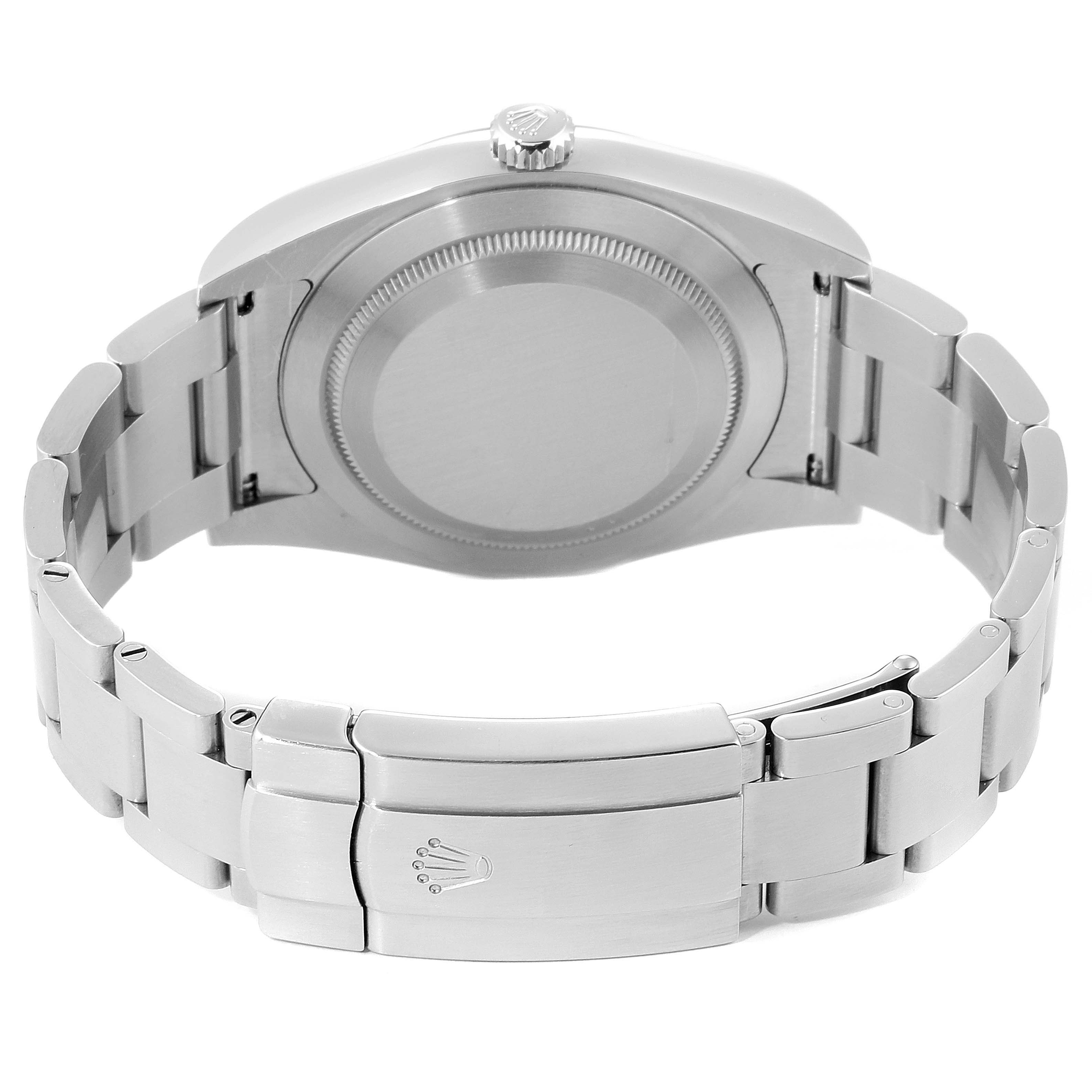 The image shows the back view of a Rolex Oyster Perpetual 114300 Men's Stainless Steel Burgundy Dial 114300 Men's Stainless Steel Burgundy Dial watch, highlighting the case back and metal bracelet with the clasp.