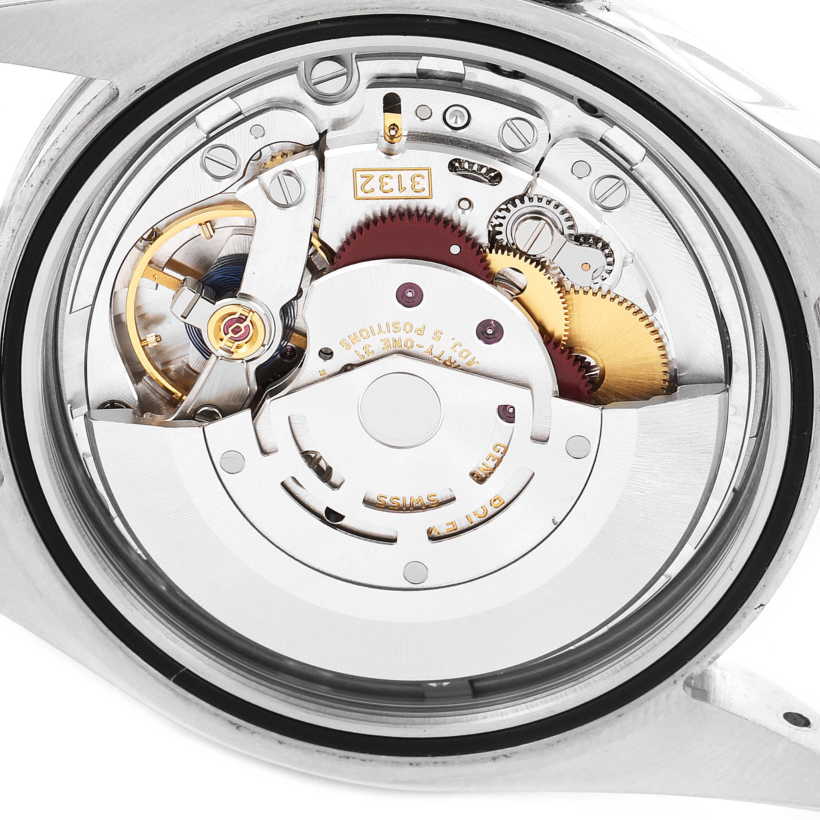 The image shows the inner movement of the Rolex Oyster Perpetual 114300 Men
s Stainless Steel Silver Dial 114300 Men
s Stainless Steel Silver Dial watch, viewed from the back case.