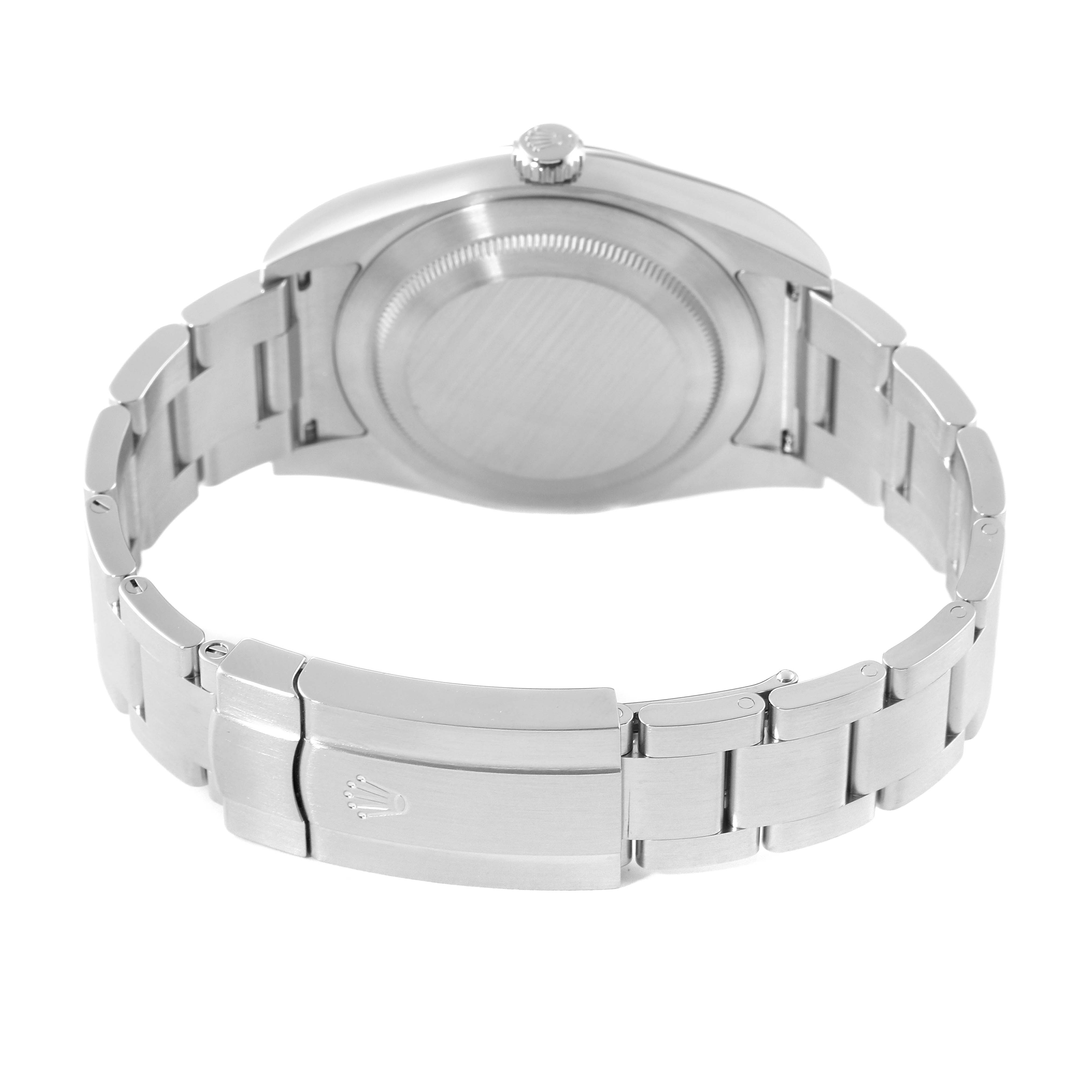 The image shows the back view of a Rolex Oyster Perpetual 114300 Men's Stainless Steel Grey Dial 114300 Men's Stainless Steel Grey Dial watch, highlighting its clasp, bracelet, and case back.
