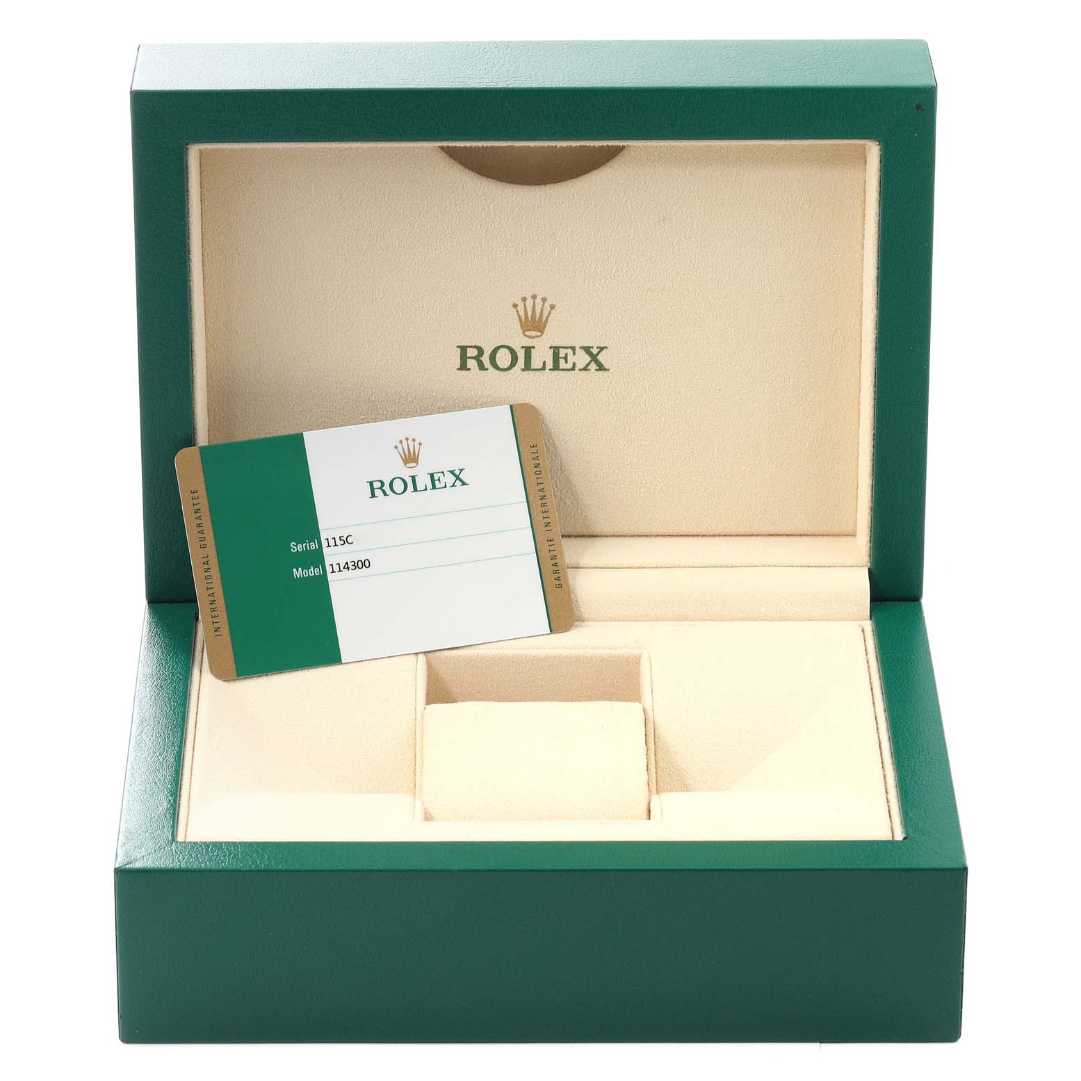 This image shows an open Rolex watch box for the Oyster Perpetual model, including a warranty card placed inside.