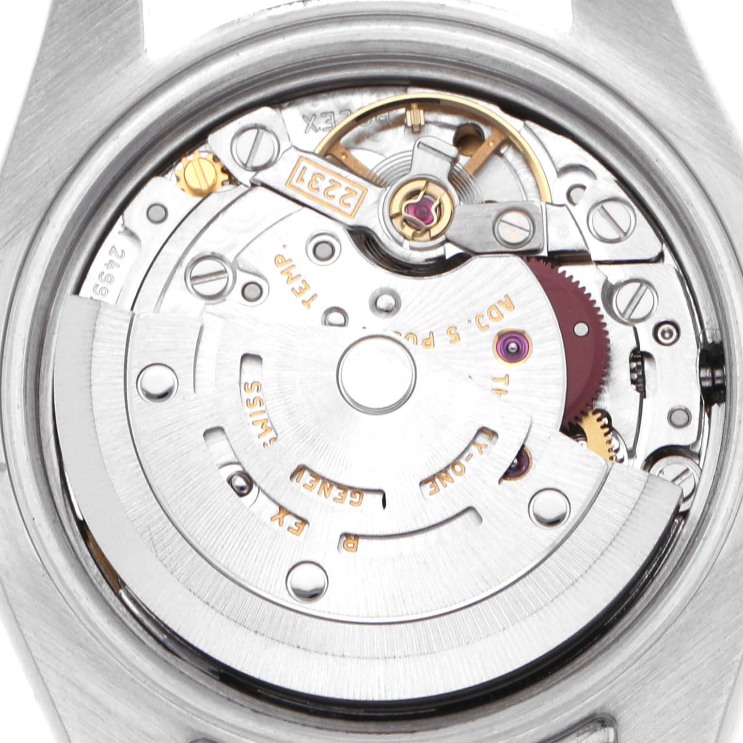 The image shows the inner mechanism of a Rolex Oyster Perpetual 176200 Women
s Stainless Steel White Dial watch from a top-down angle, highlighting its rotor and movement components.
