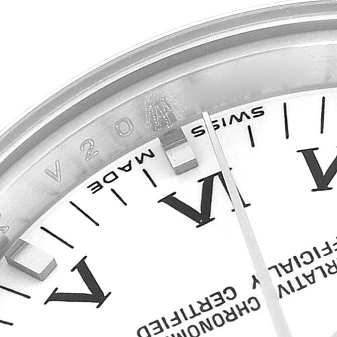 The image shows a close-up of the watch face, bezel, and hands of a Rolex Oyster Perpetual 176200 Women
s Stainless Steel White Dial, highlighting the dial and markings.