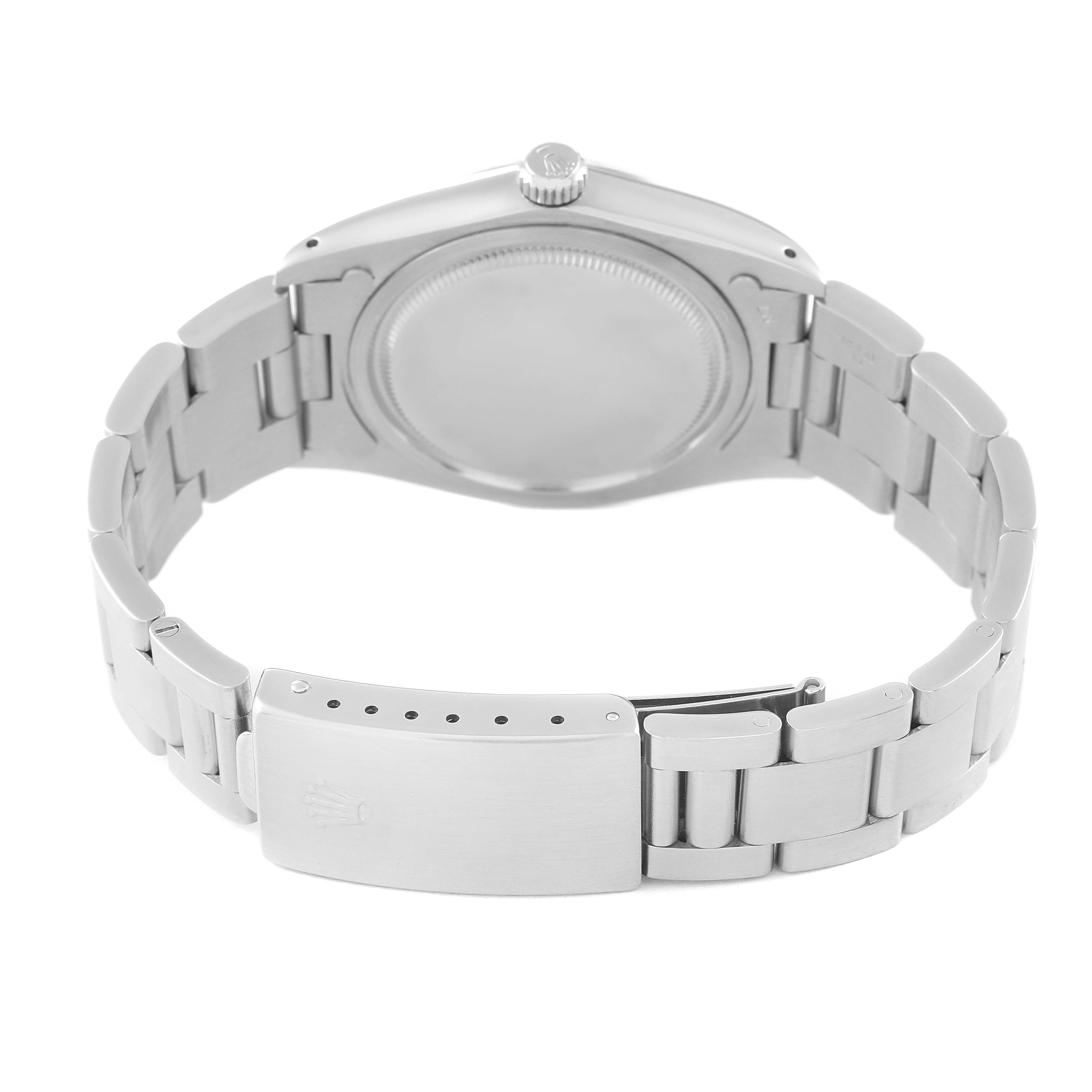 The image shows the backside of a Vintage Collection watch by Rolex, highlighting the case back and bracelet clasp.