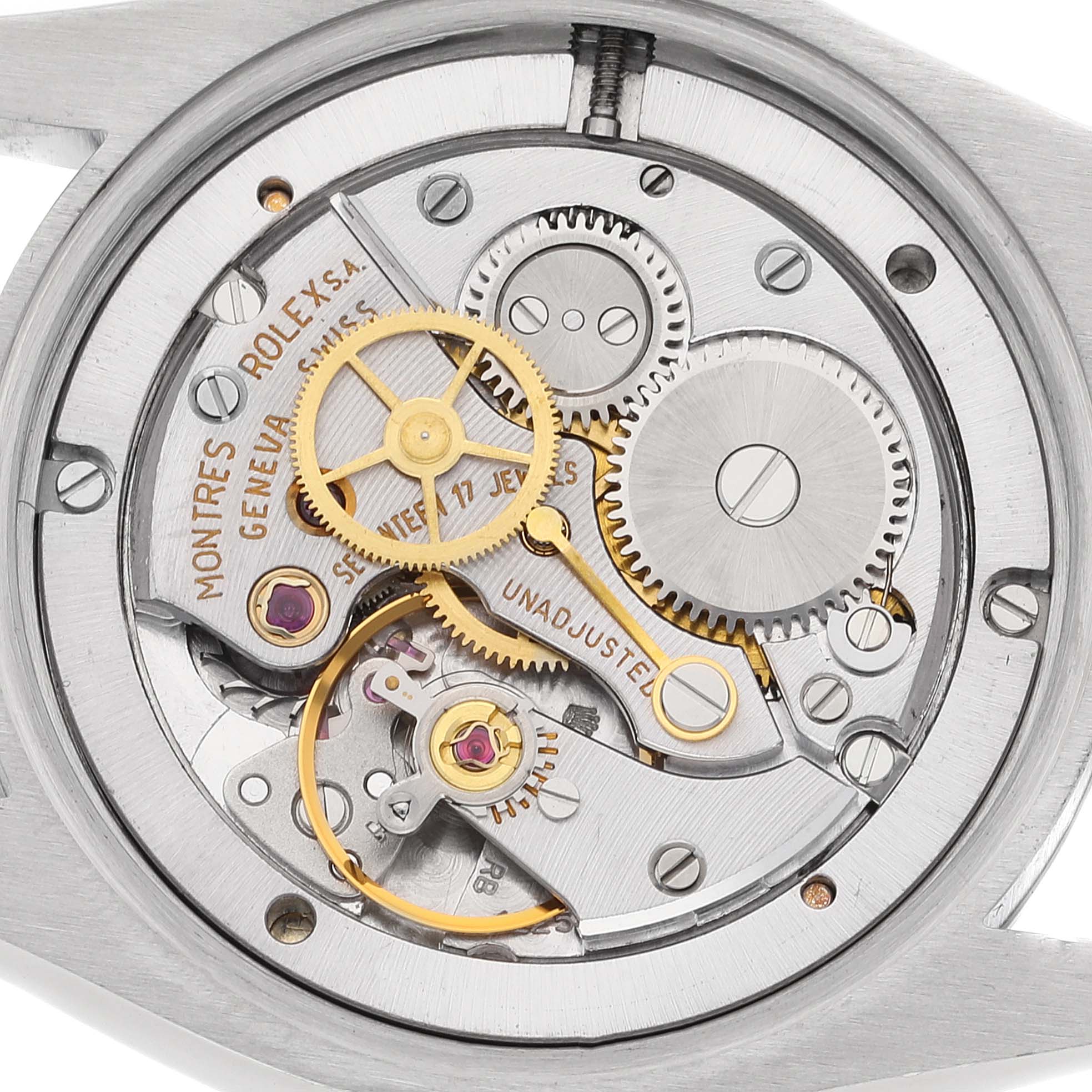 This image shows an inside view of the Rolex Vintage Collection 6694 Men's Stainless Steel Silver Dial 6694 Men's Stainless Steel Silver Dial model's intricate watch movement and gears.
