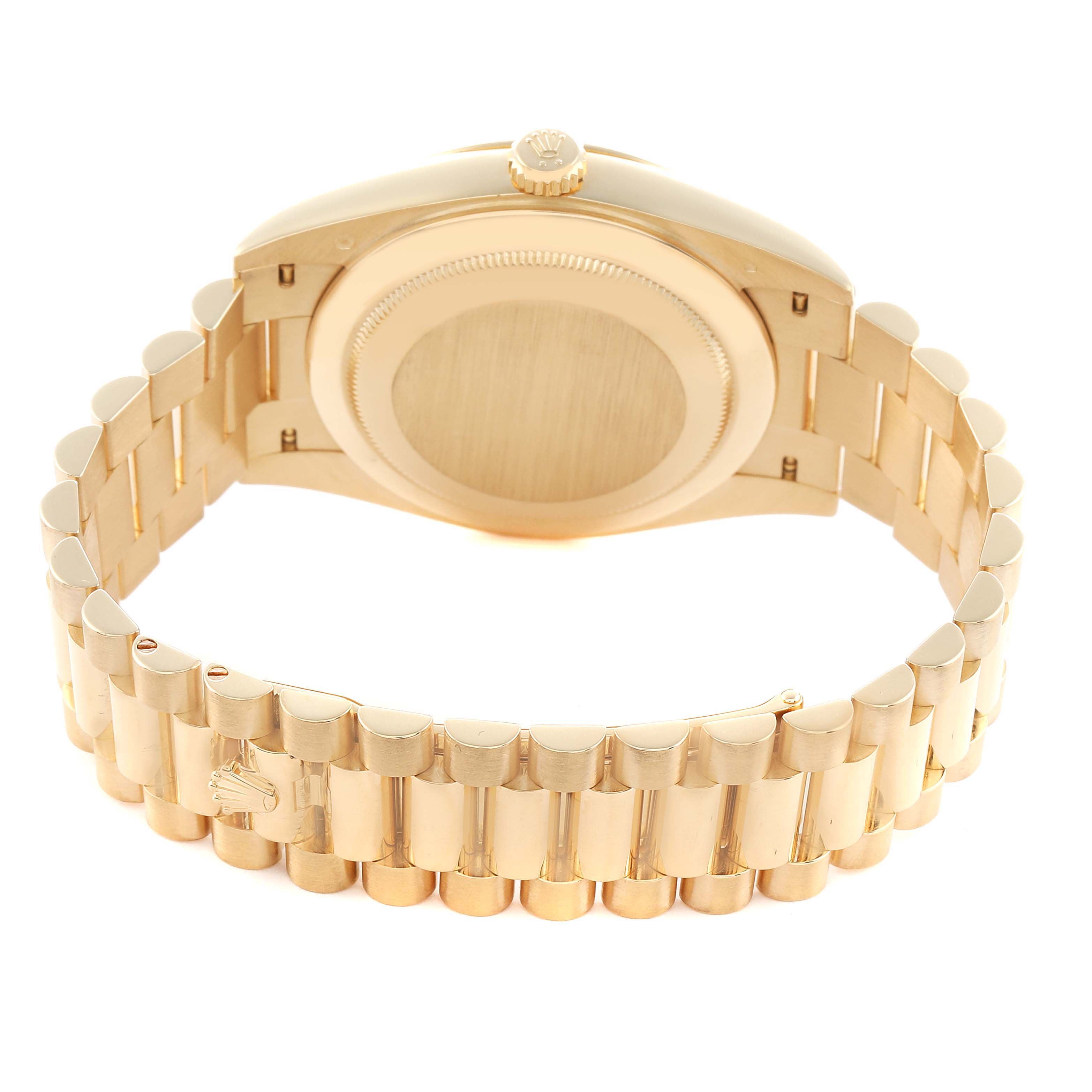 The image shows the back and bracelet of a Rolex President 228238 Men
s Yellow Gold Black Dial watch, emphasizing the case back and gold link design.