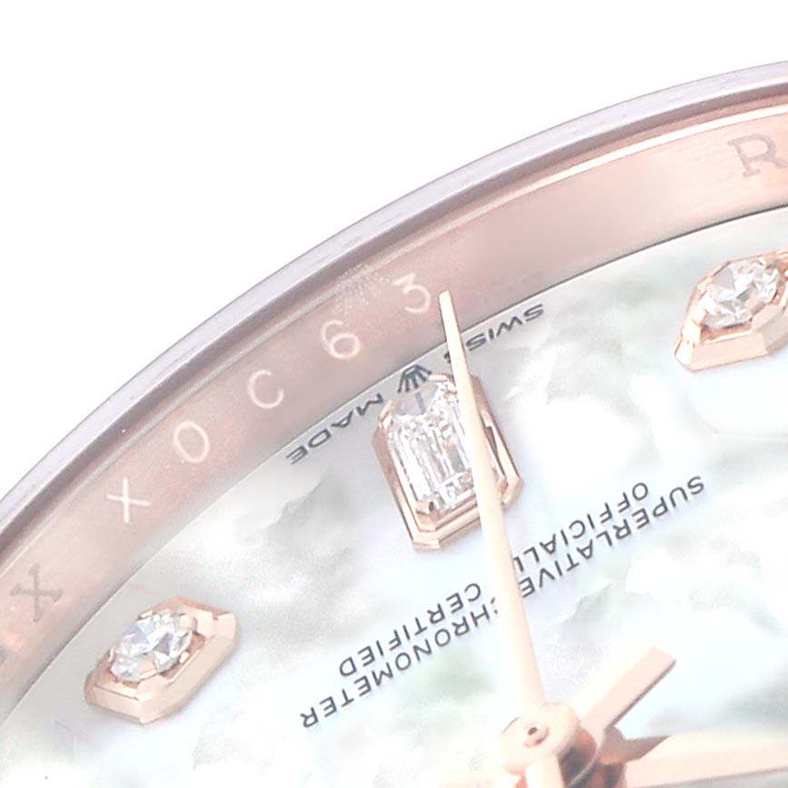 The image shows a close-up of a Rolex President 128235 Men
s Rose Gold Mother of Pearl Dial model watch, focusing on the dial and gemstone hour markers.
