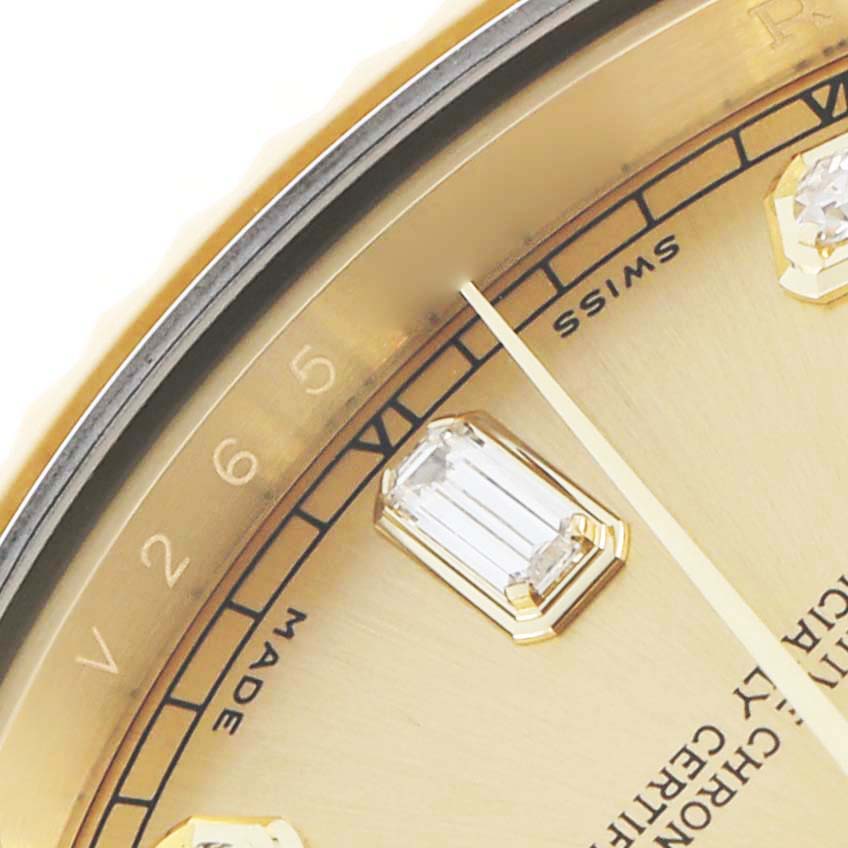 The image shows a close-up of the Rolex President 218238 Men
s Yellow Gold Champagne Dial watch face, highlighting the bezel, dial, and diamond hour markers.