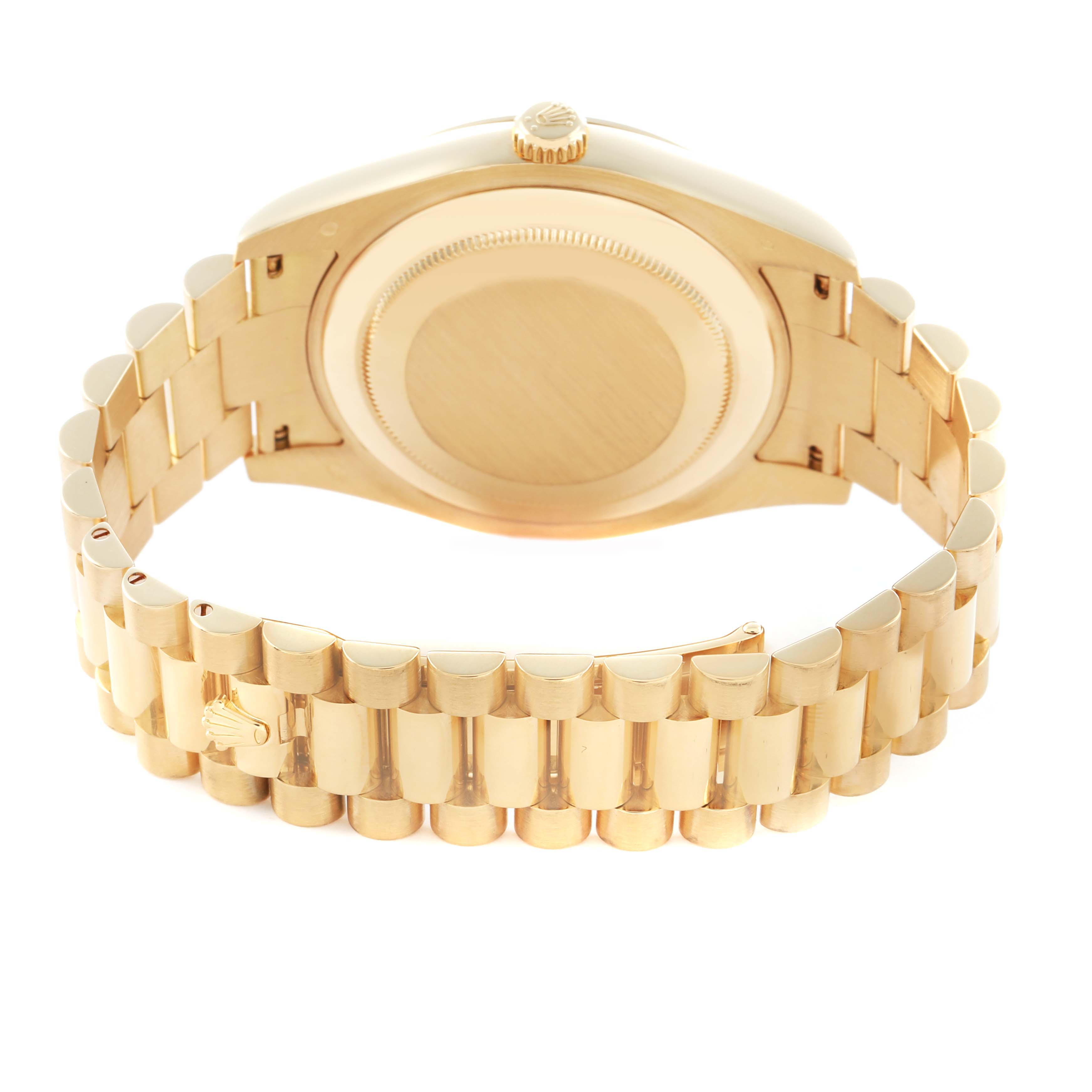 The image shows the gold case back and bracelet of a Rolex President 218238 Men
s Yellow Gold Champagne Dial model, viewed from the rear angle.