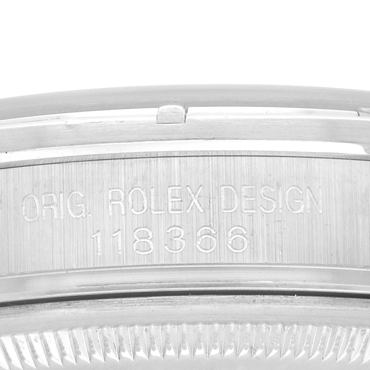 The image shows the side view of the Rolex President 118366 Men
s Platinum Silver Dial model
s case, displaying the engraved design number.