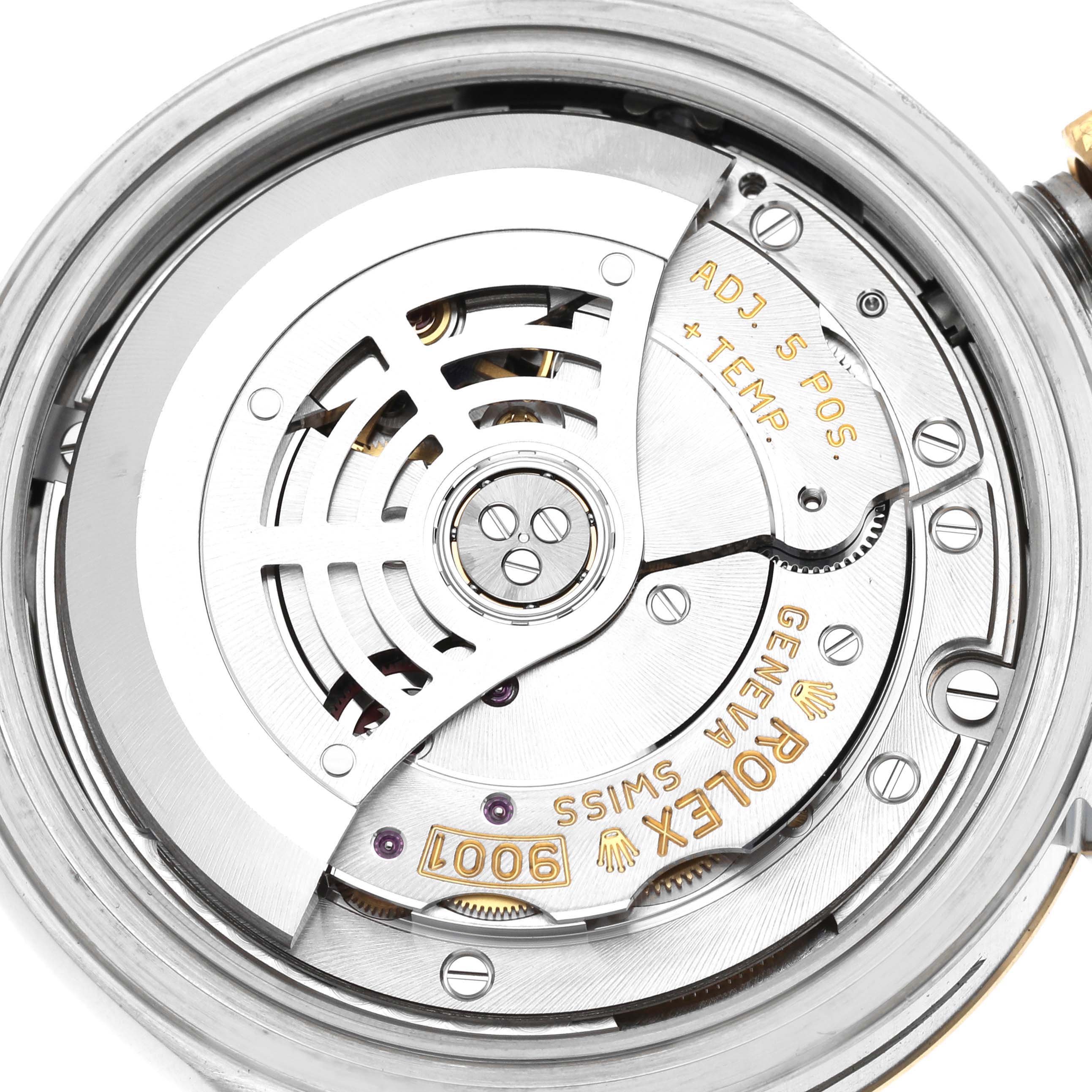 This image shows the inner mechanism and rotor of a Rolex Sky-Dweller 326933 Men's Steel and Gold (two tone) White Dial 326933 Men's Steel and Gold (two tone) White Dial watch viewed from the back.