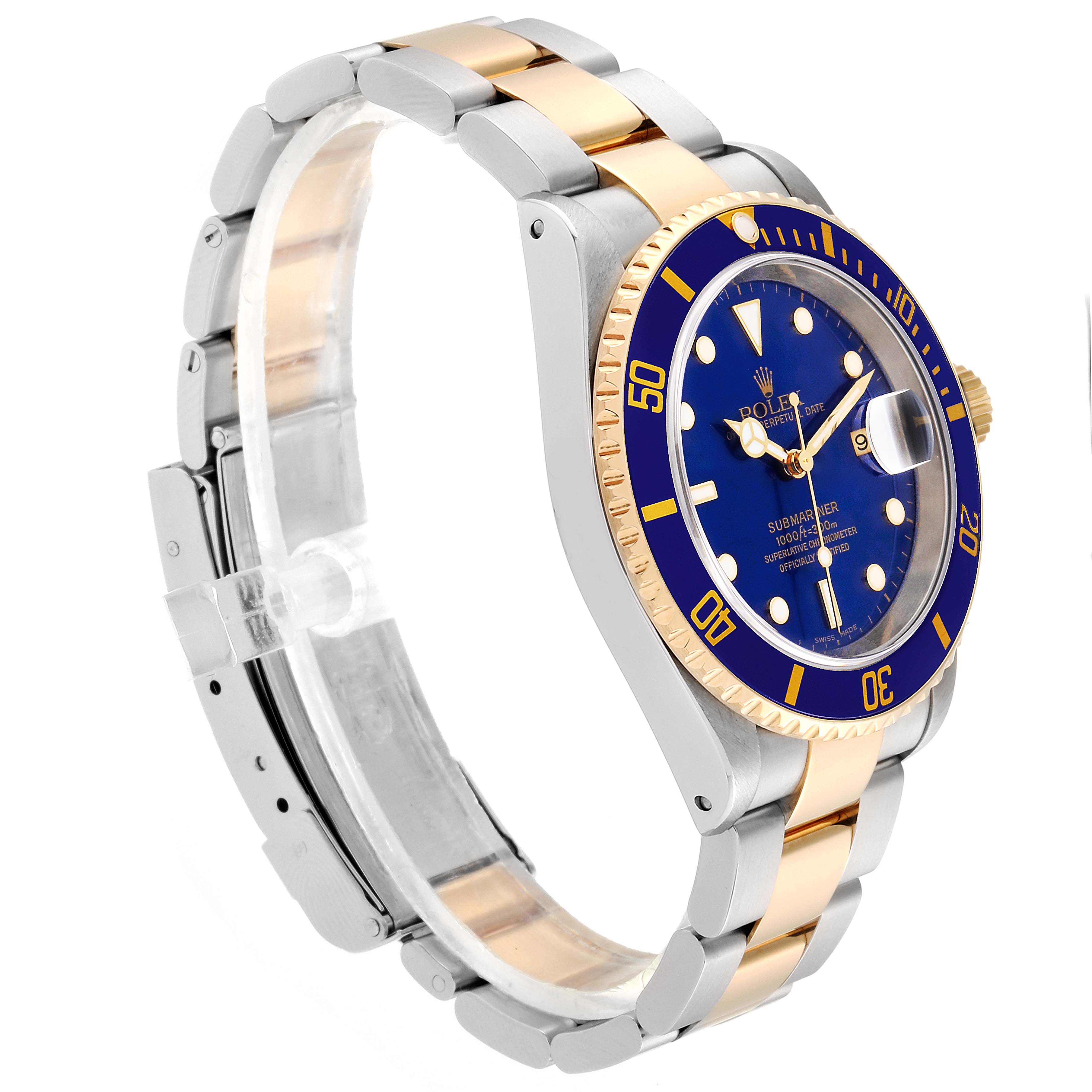 The image shows a Rolex Submariner 16613 Men's Steel and Gold (two tone) Blue Dial 16613 Men's Steel and Gold (two tone) Blue Dial watch at a three-quarter angle, highlighting its bezel, dial, and two-tone bracelet.