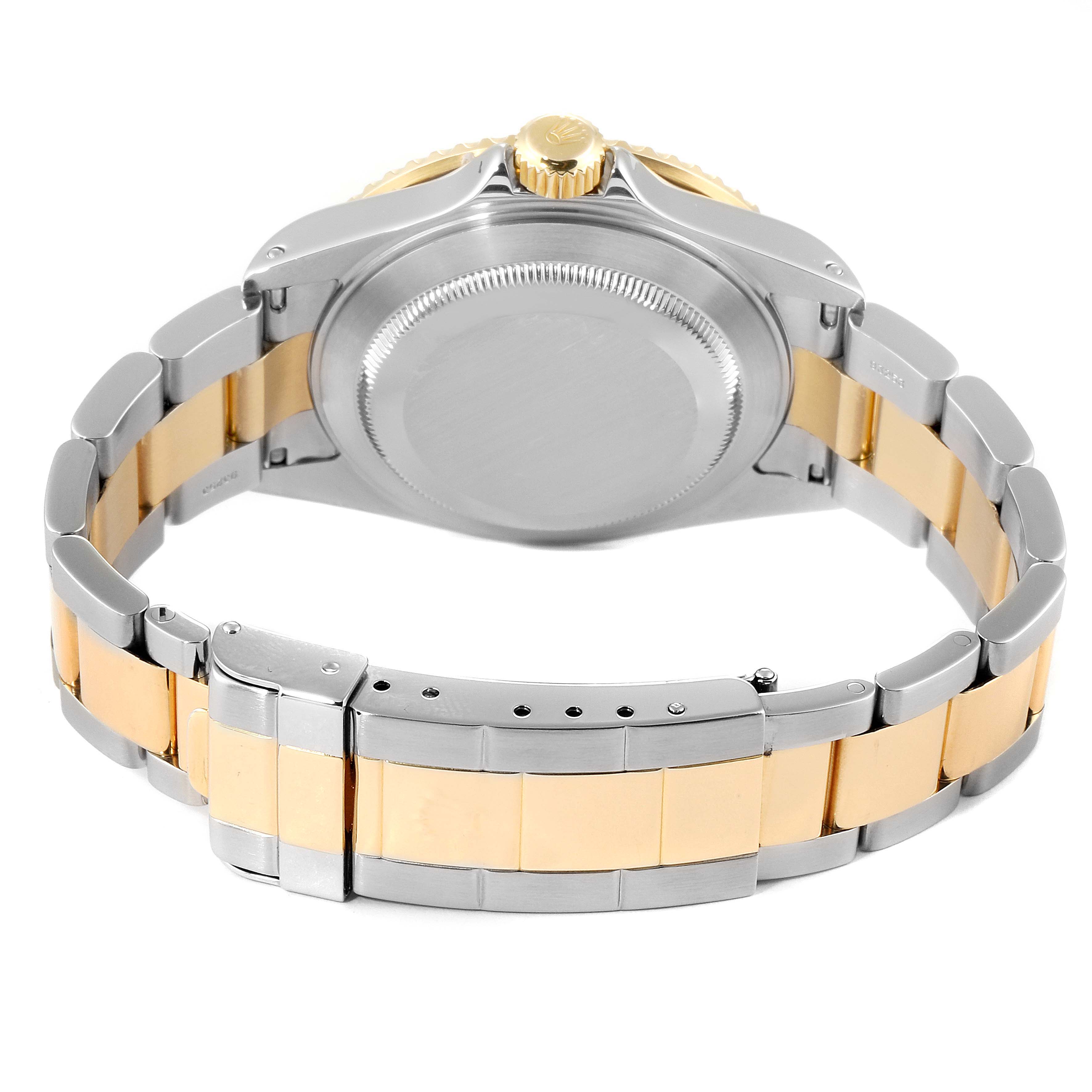 The image shows the back and bracelet of the Rolex Submariner 16613 Men's Steel and Gold (two tone) Blue Dial 16613 Men's Steel and Gold (two tone) Blue Dial watch, focusing on the stainless steel and gold links.