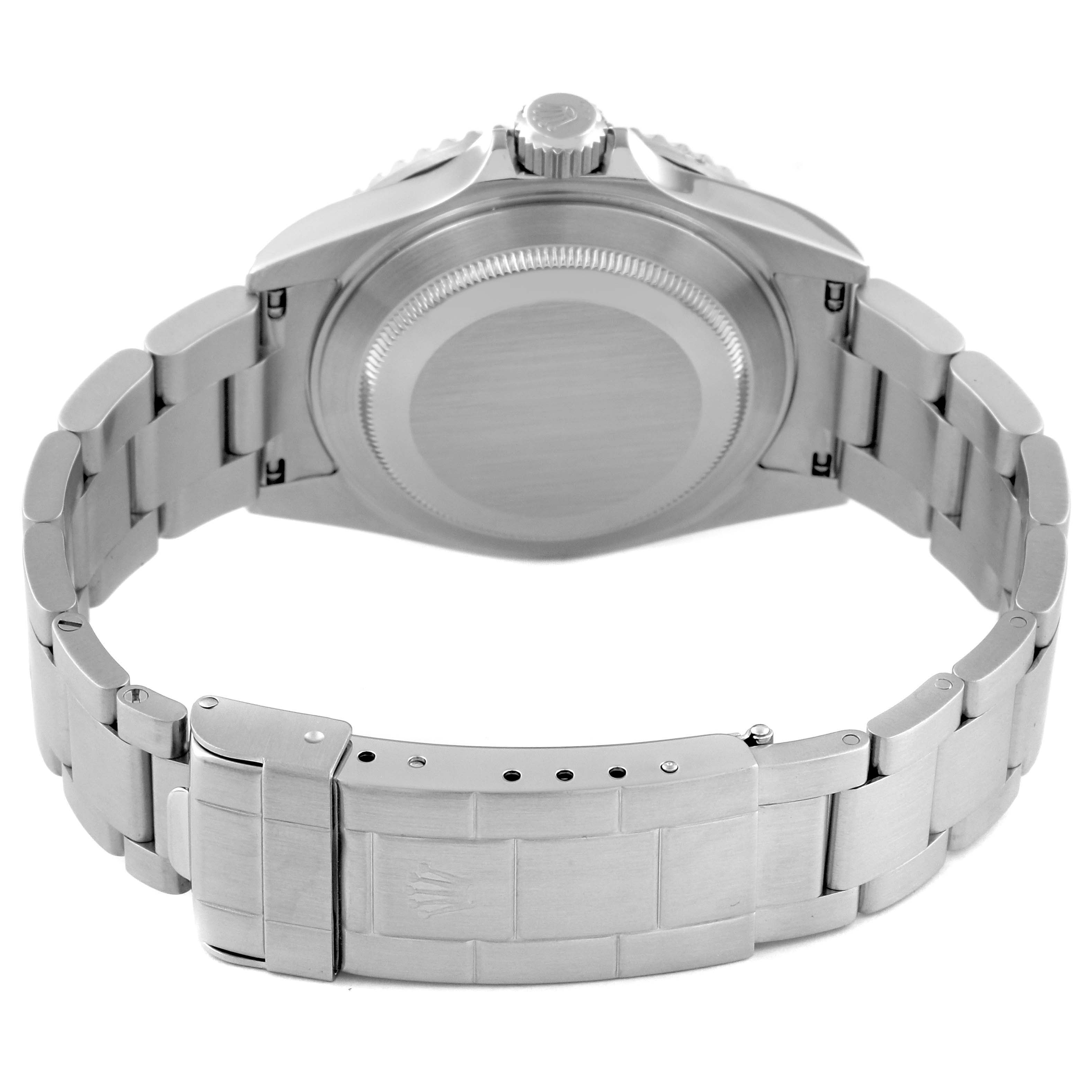 The image shows the back view of a Rolex Submariner 16610 Men
s Stainless Steel Black Dial 16610 Men
s Stainless Steel Black Dial watch, highlighting the case back, bracelet, and clasp.