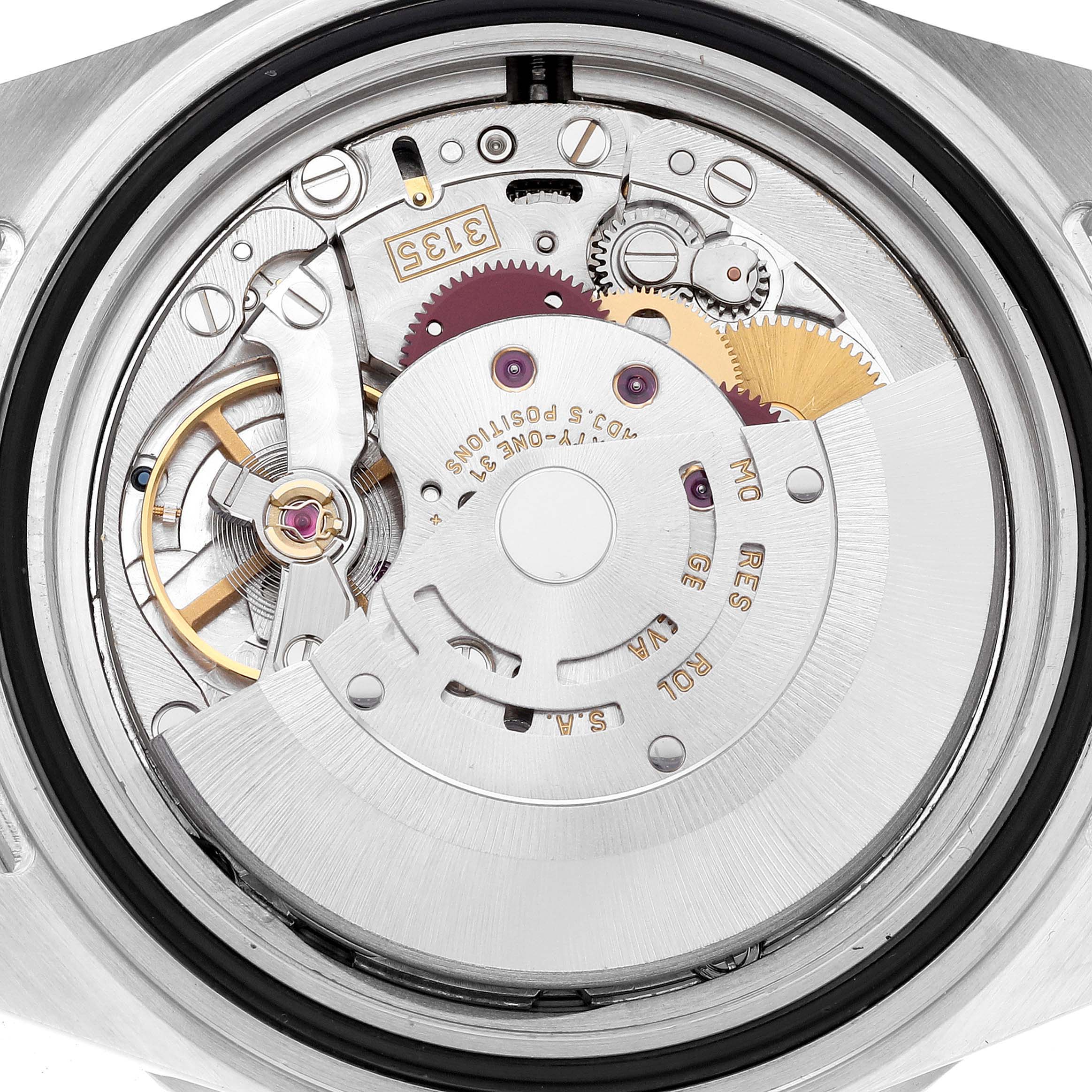 This image shows the exposed mechanical movement of a Rolex Submariner 16610 Men's Stainless Steel Black Dial 16610 Men's Stainless Steel Black Dial watch, taken from a rear angle.