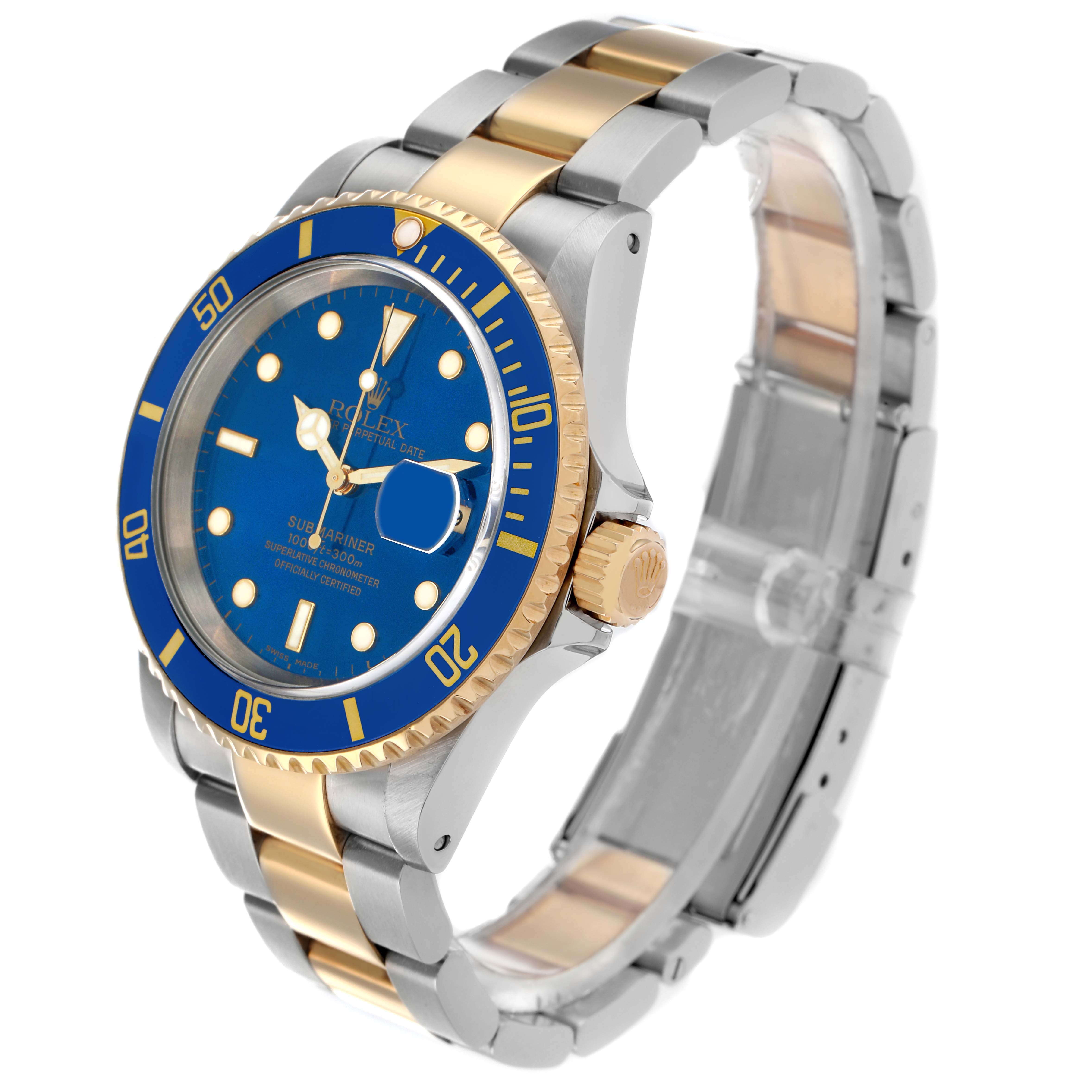 The Rolex Submariner 16613 Men
s Steel and Gold (two tone) Blue Dial watch is shown at a three-quarter angle, displaying its blue dial, gold bezel, and two-tone bracelet.