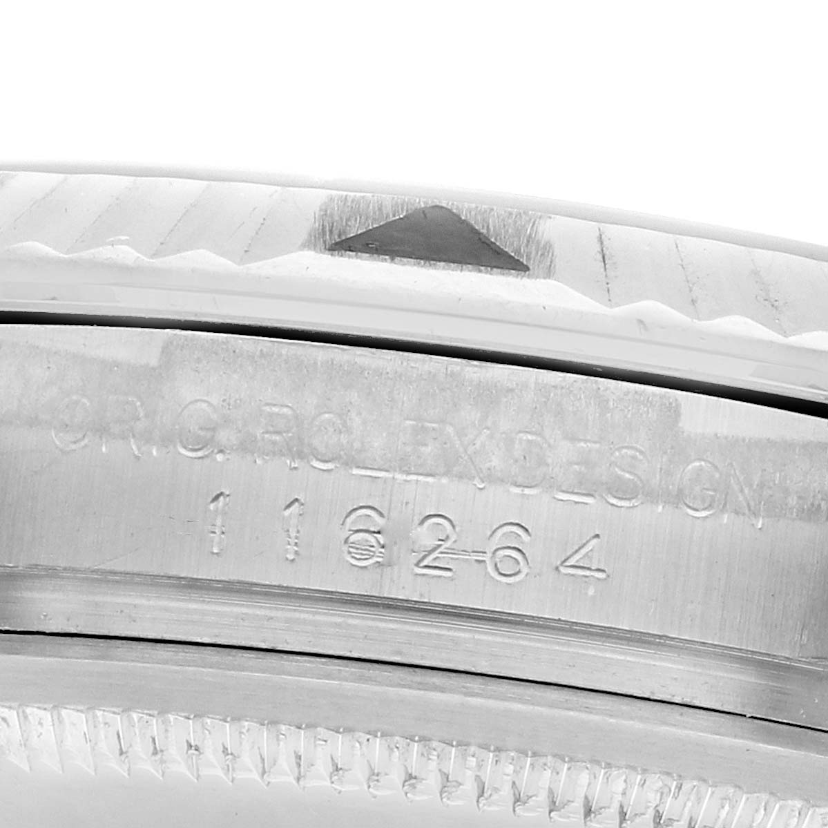 The image shows a close-up of the side of a Rolex Turn-o-Graph 116264 Men
s Stainless Steel Black Dial watch, highlighting the engraved design number.