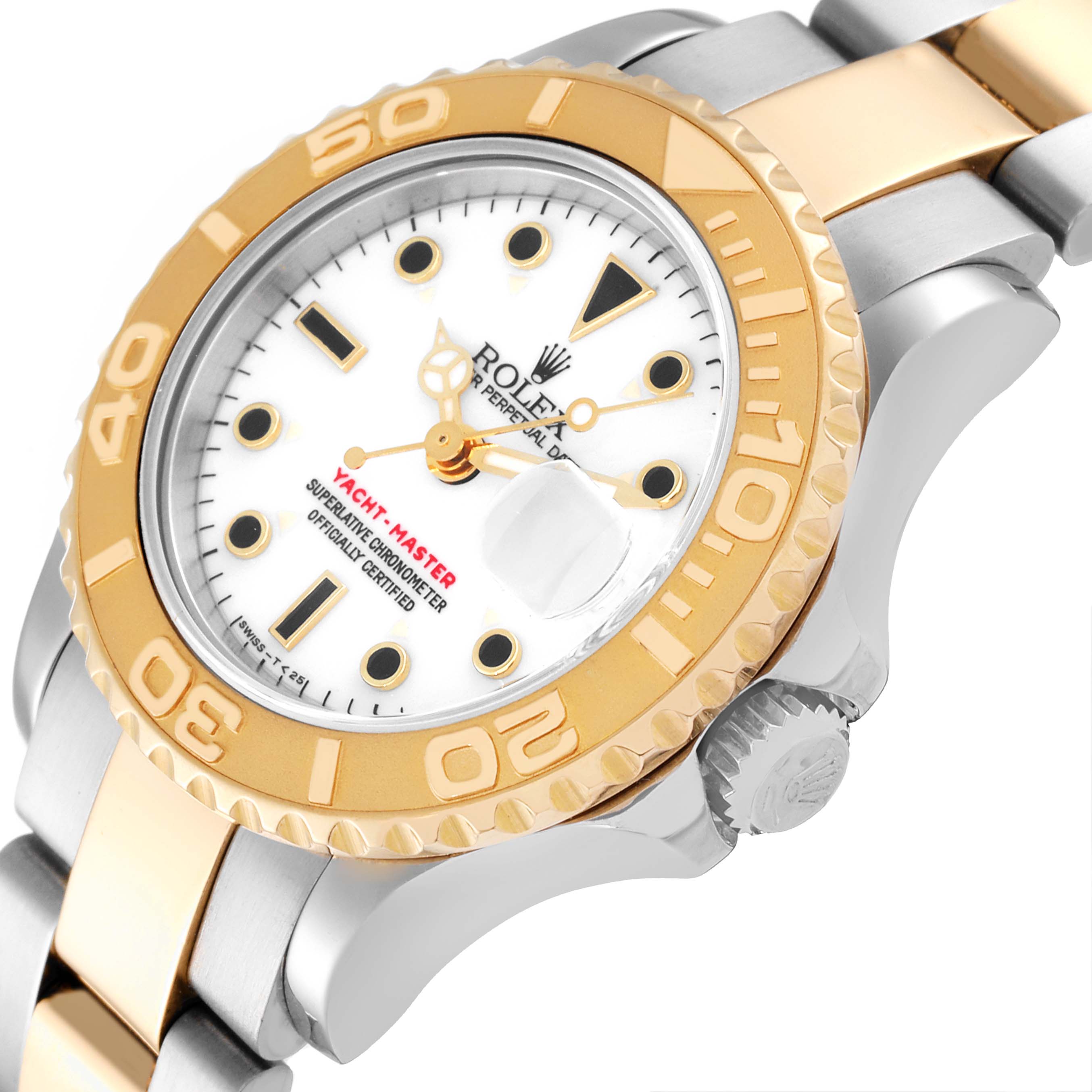 This image shows a close-up of a Rolex Yacht-Master 69623 Women's Steel and Gold (two tone) White Dial 69623 Women's Steel and Gold (two tone) White Dial watch, highlighting its dial, bezel, and part of the bracelet at an angled view.