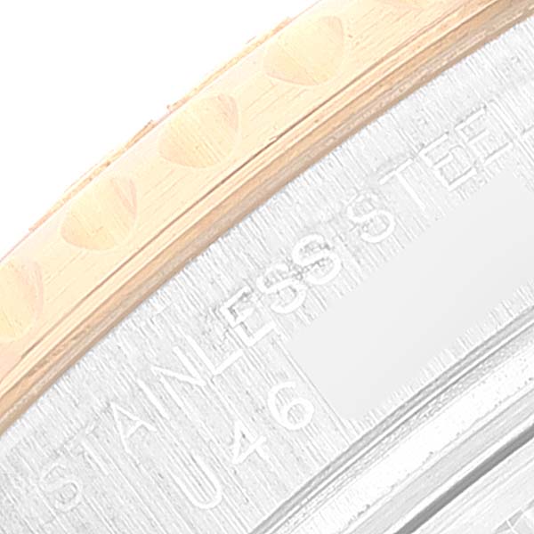 This image shows a close-up of the bezel and stainless steel case of a Rolex Yacht-Master 69623 Women's Steel and Gold (two tone) White Dial 69623 Women's Steel and Gold (two tone) White Dial model.