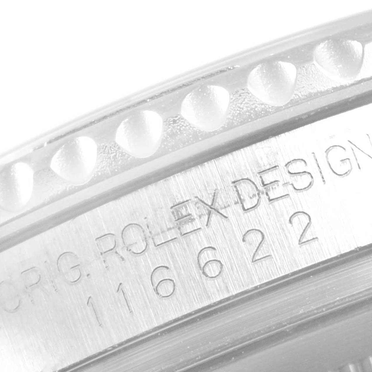 This close-up image shows part of the bezel and the engraved model and design information of a Rolex Yacht-Master 116622 Men's Stainless Steel Blue Dial 116622 Men's Stainless Steel Blue Dial watch.