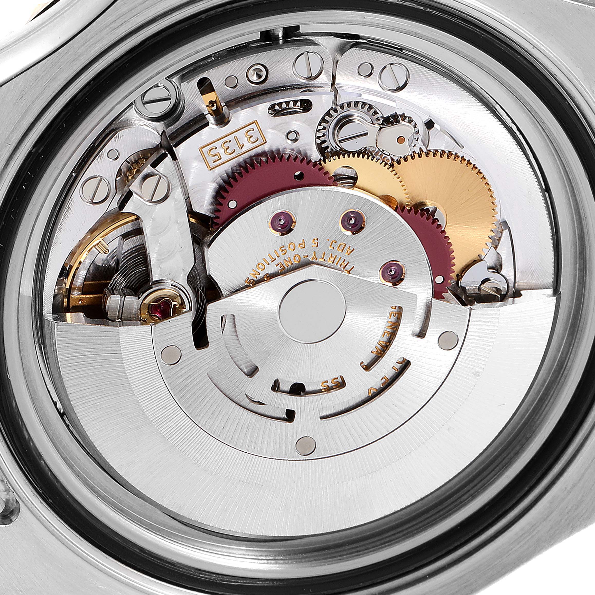 The image shows the internal mechanism of a Rolex Yacht-Master 16623 Men
s Steel and Gold (two tone) Champagne Dial 16623 Men
s Steel and Gold (two tone) Champagne Dial watch, featuring gears and the rotor.