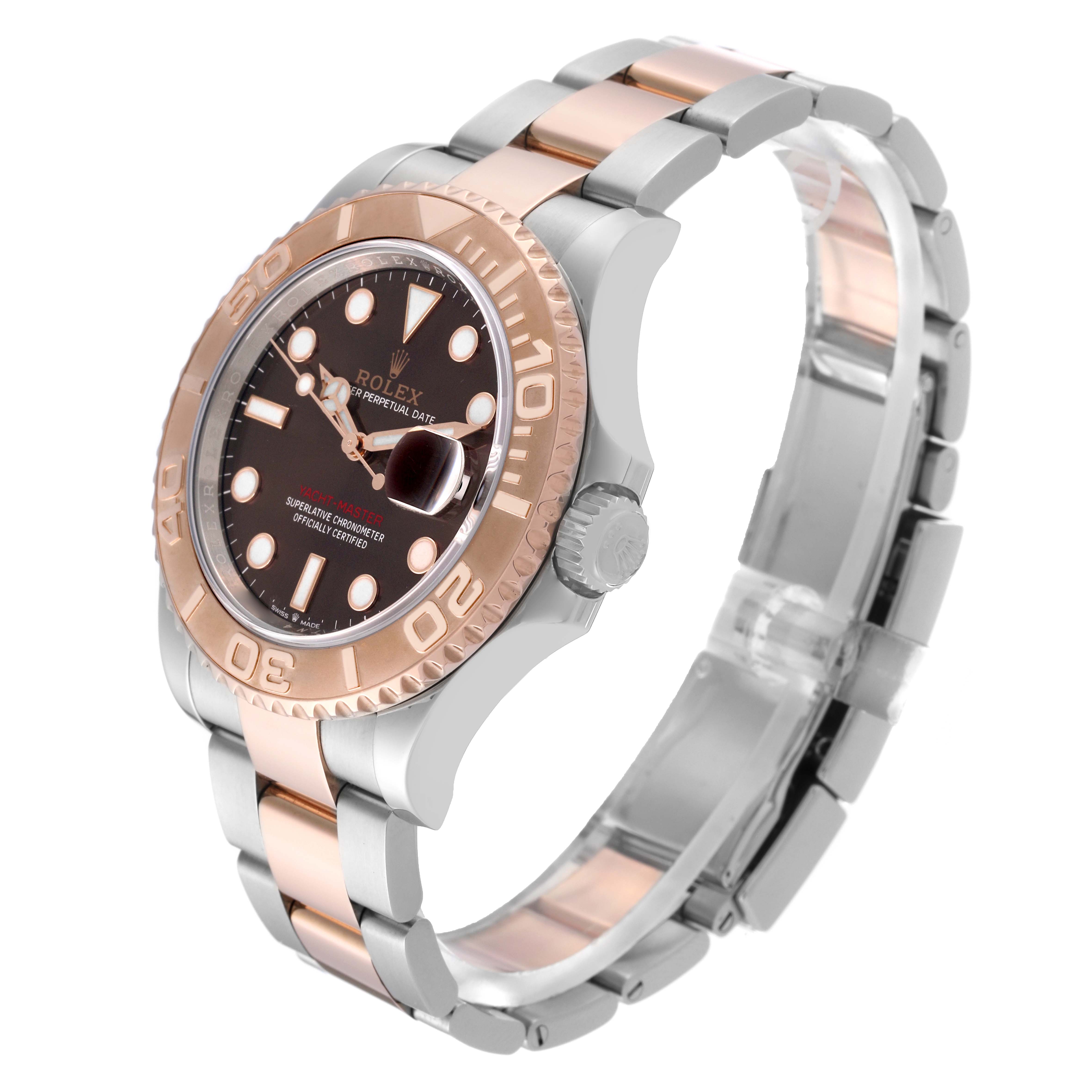The Rolex Yacht-Master 126621 Men's Steel and Gold (two tone) Brown Dial 126621 Men's Steel and Gold (two tone) Brown Dial watch is shown at an angle, highlighting the bezel, dial, crown, and bracelet.