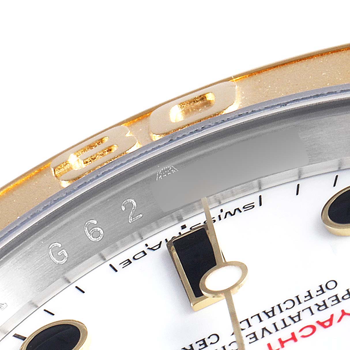 This close-up shows the dial, bezel, and part of the minute hand of a Rolex Yacht-Master 16623 Men's Steel and Gold (two tone) White Dial 16623 Men's Steel and Gold (two tone) White Dial watch.