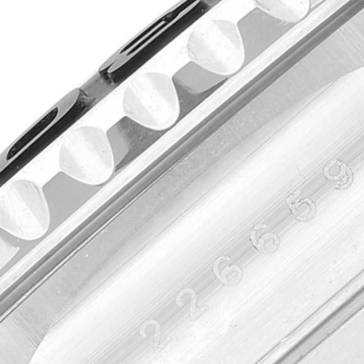 This close-up view shows the engraved case and the textured bezel of a Rolex Yacht-Master 226659 Men's Stainless Steel Black Dial 226659 Men's Stainless Steel Black Dial watch.